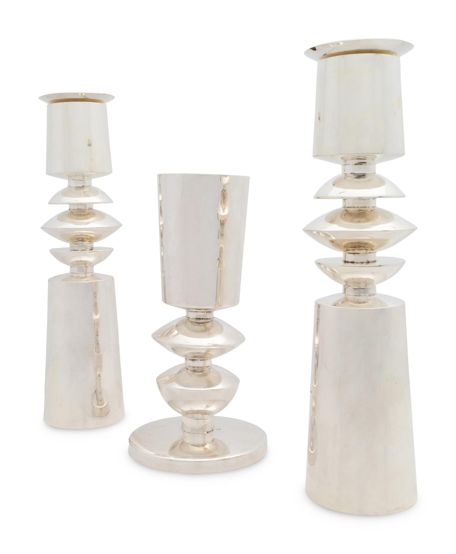 A Carmel Shabi Modernist Silver Kiddish Cup and Pair of Shabbat Candlesticks
