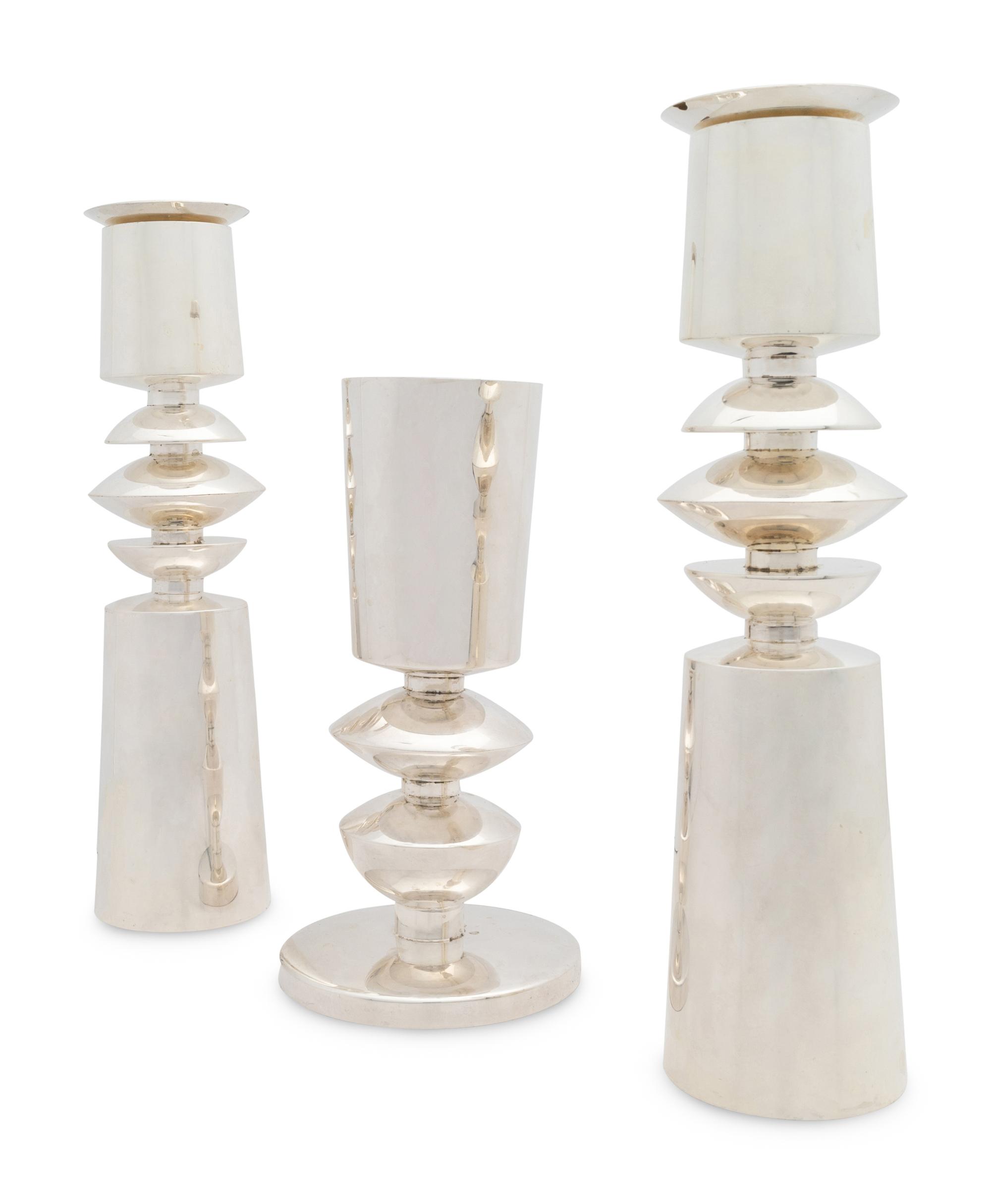 A Carmel Shabi Modernist Silver Kiddish Cup and Pair of Shabbat Candlesticks