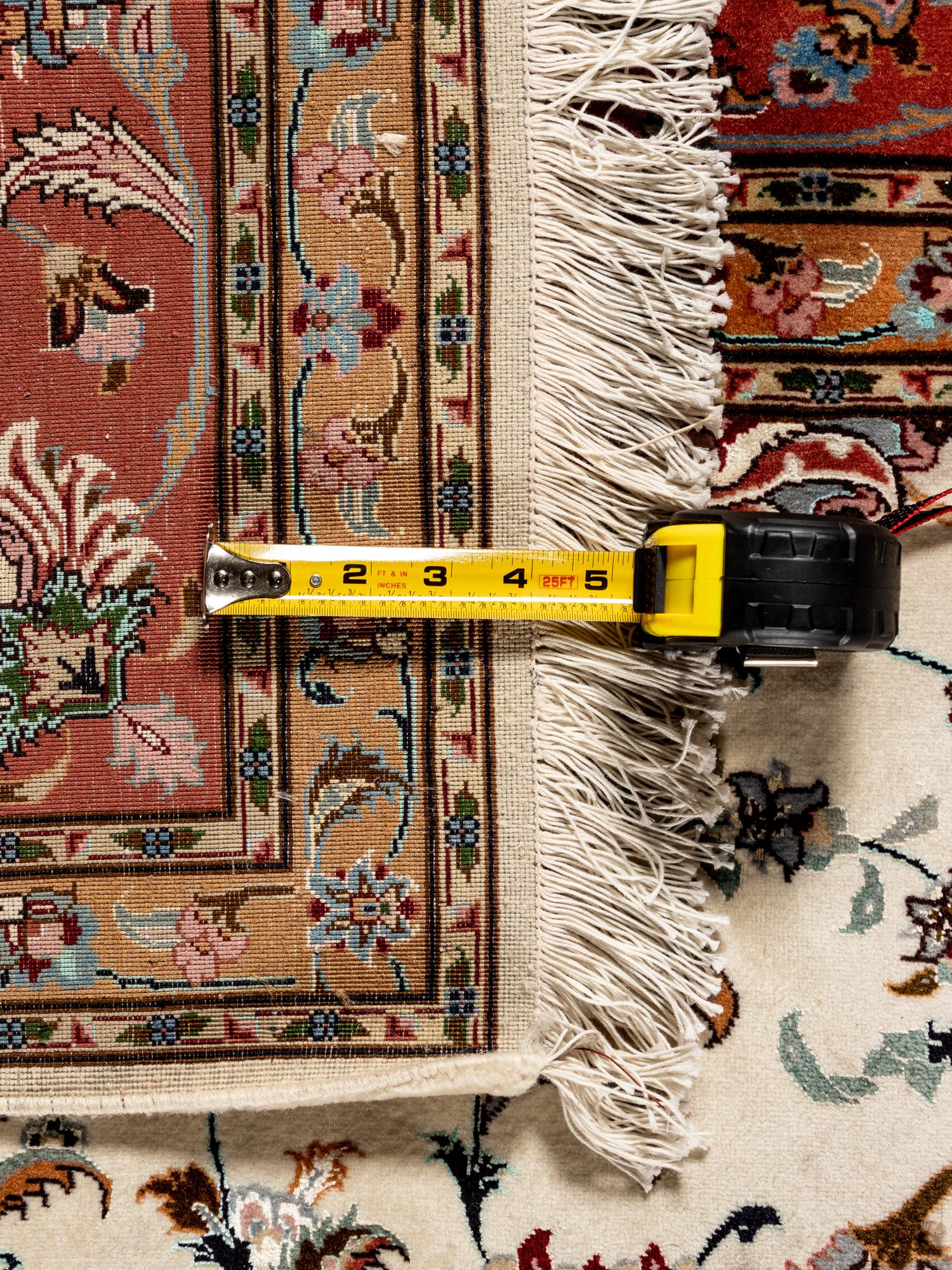 A Tabriz Wool Rug