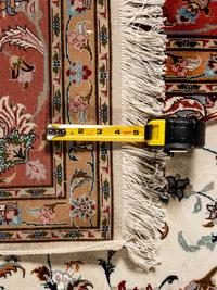 A Tabriz Wool Rug