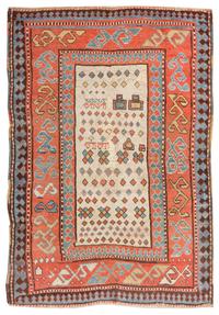 A Kazakh Wool Rug 5 feet 3 inches x 3 feet 9 inches. — CIRCA 1870