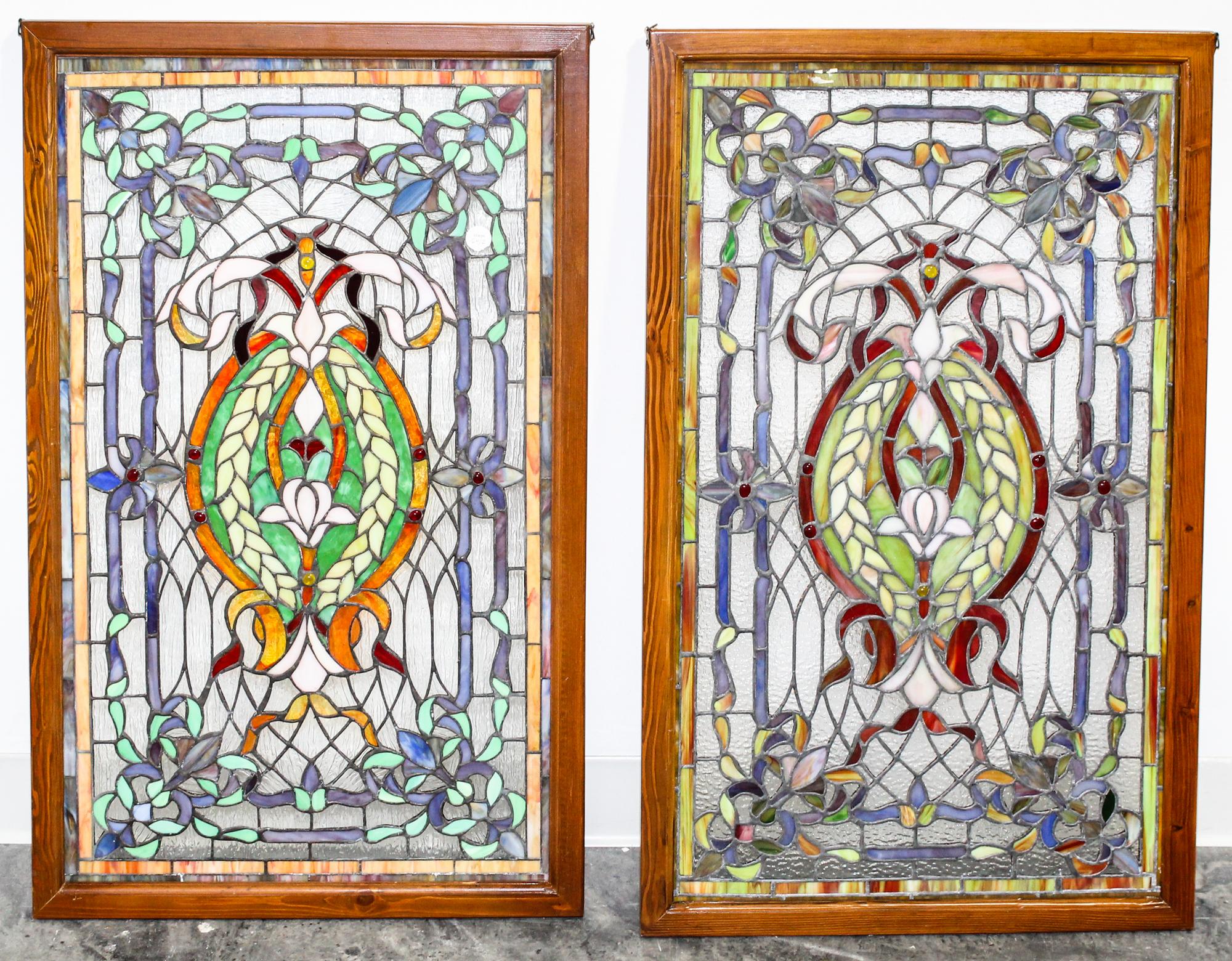 A Pair of Leaded Glass Windows. Height 39 1/2 x width 19 1/4 inches.
