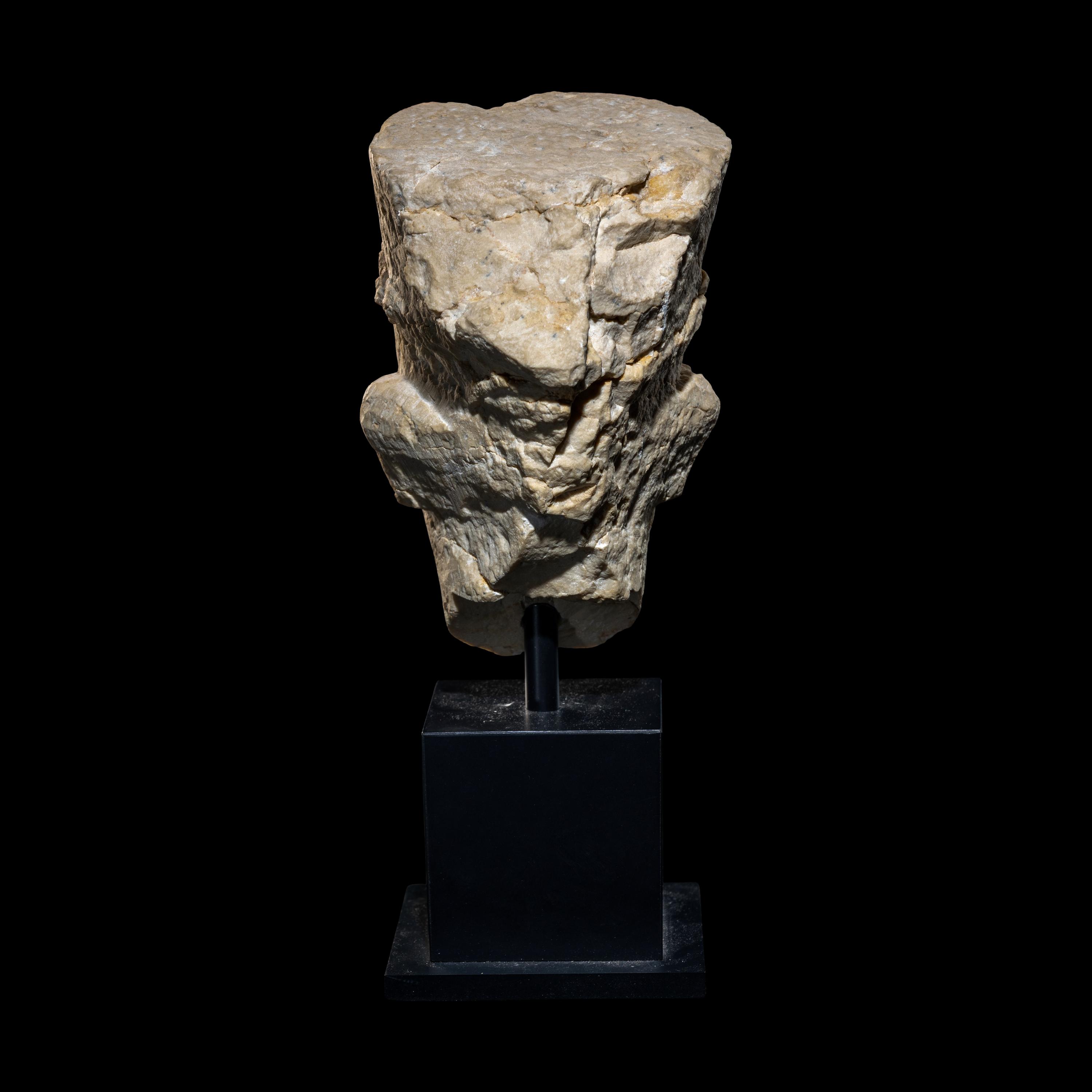 A Palmyrene Limestone Head of a Priest