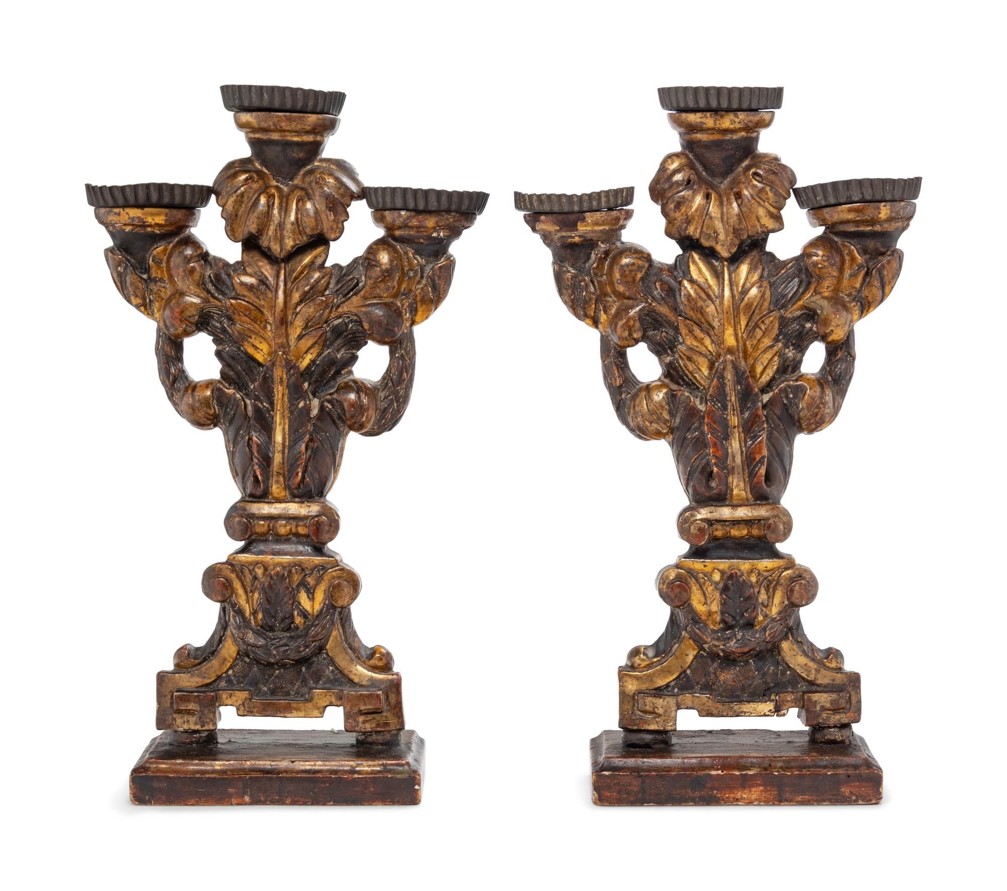 A Pair of Italian Painted and Parcel Gilt Three-Light Candelabra