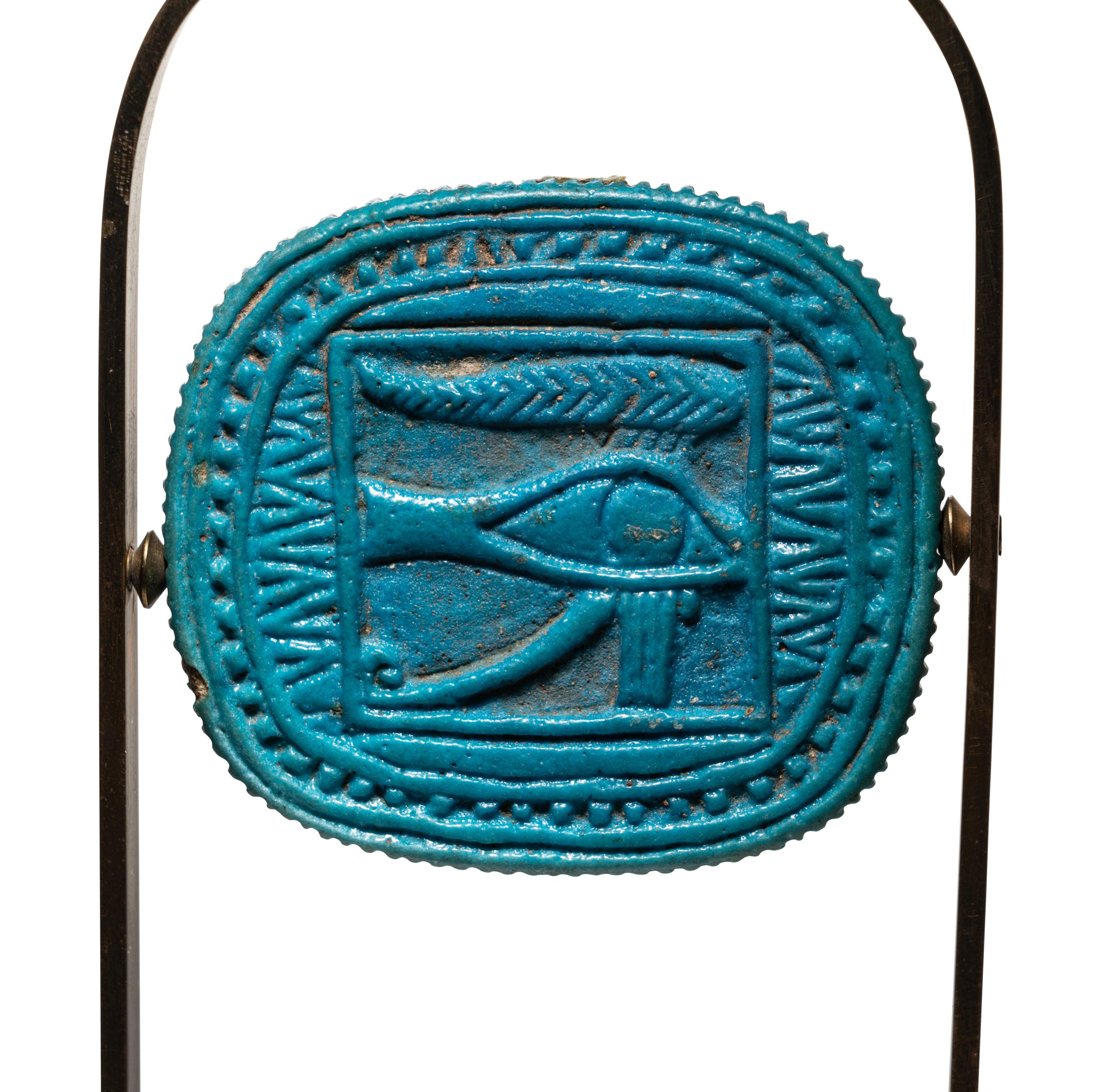 An Egyptian Faience Double-Sided Plaque