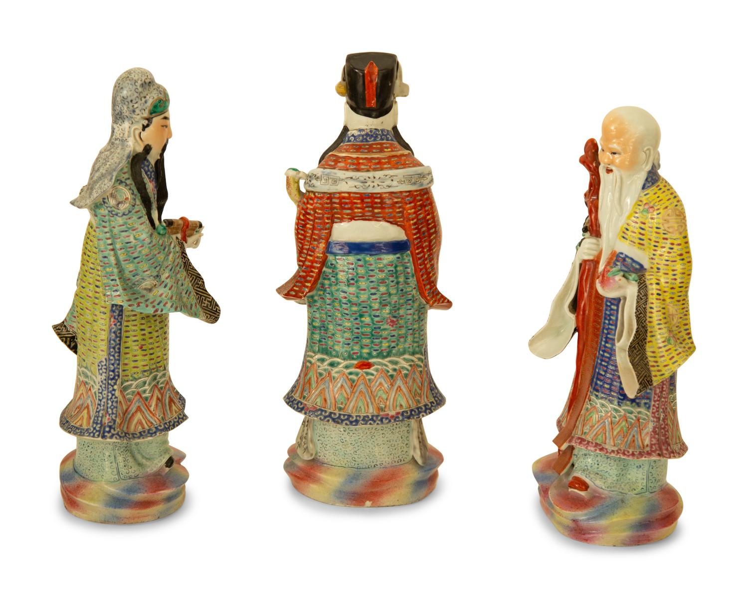 Three Chinese Porcelain Scholar Figures