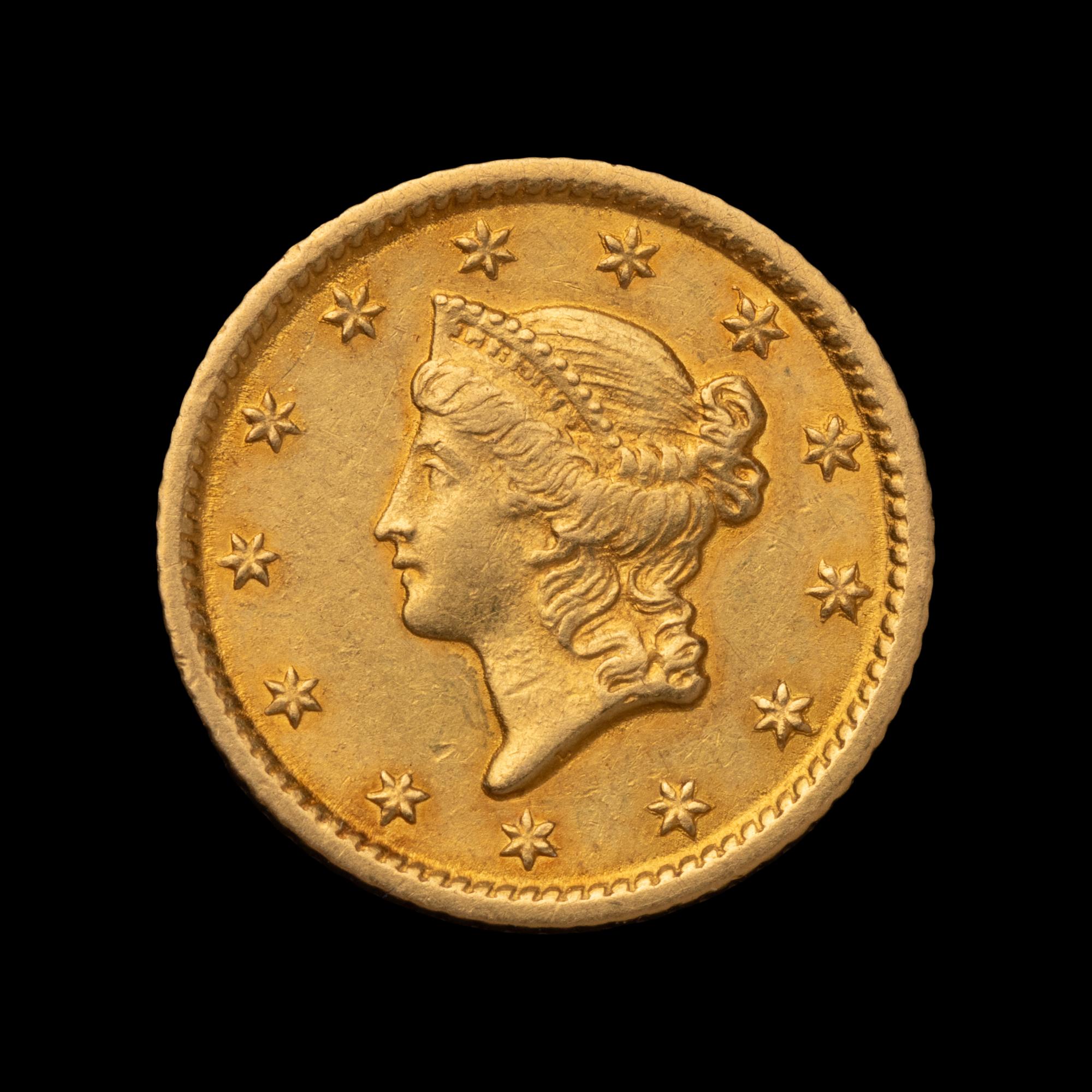 An 1853-O Liberty Head $1 Gold Coin