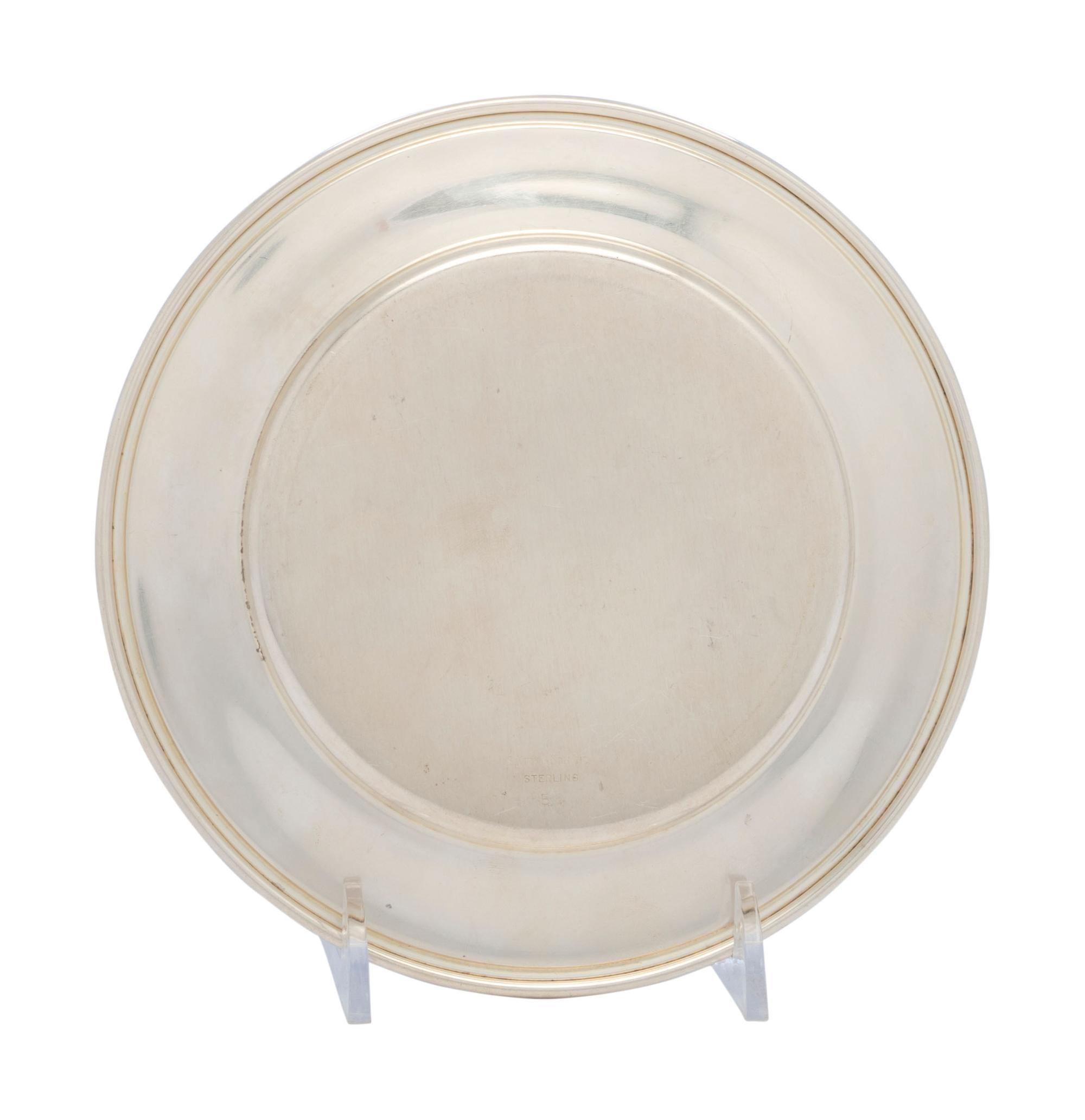 A Set of Twelve American Silver Bread Plates