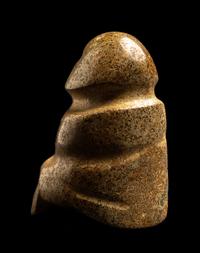 A Mezcala Green-White Stone Seated Figure