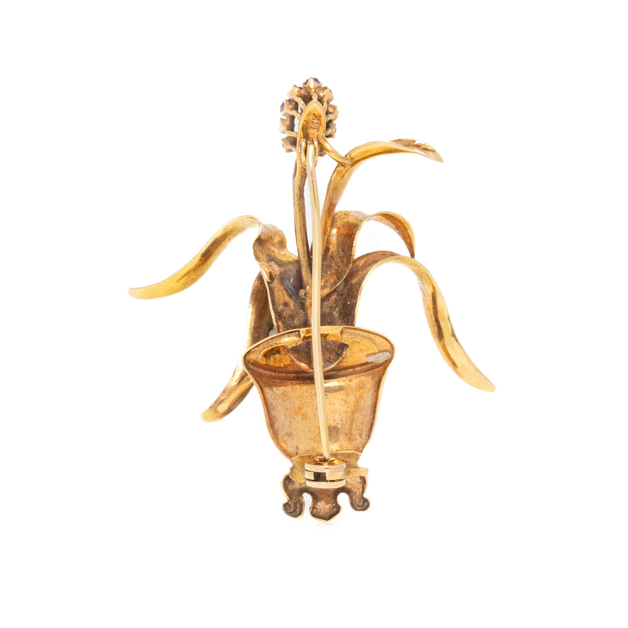 YELLOW GOLD AND RUBY BROOCH