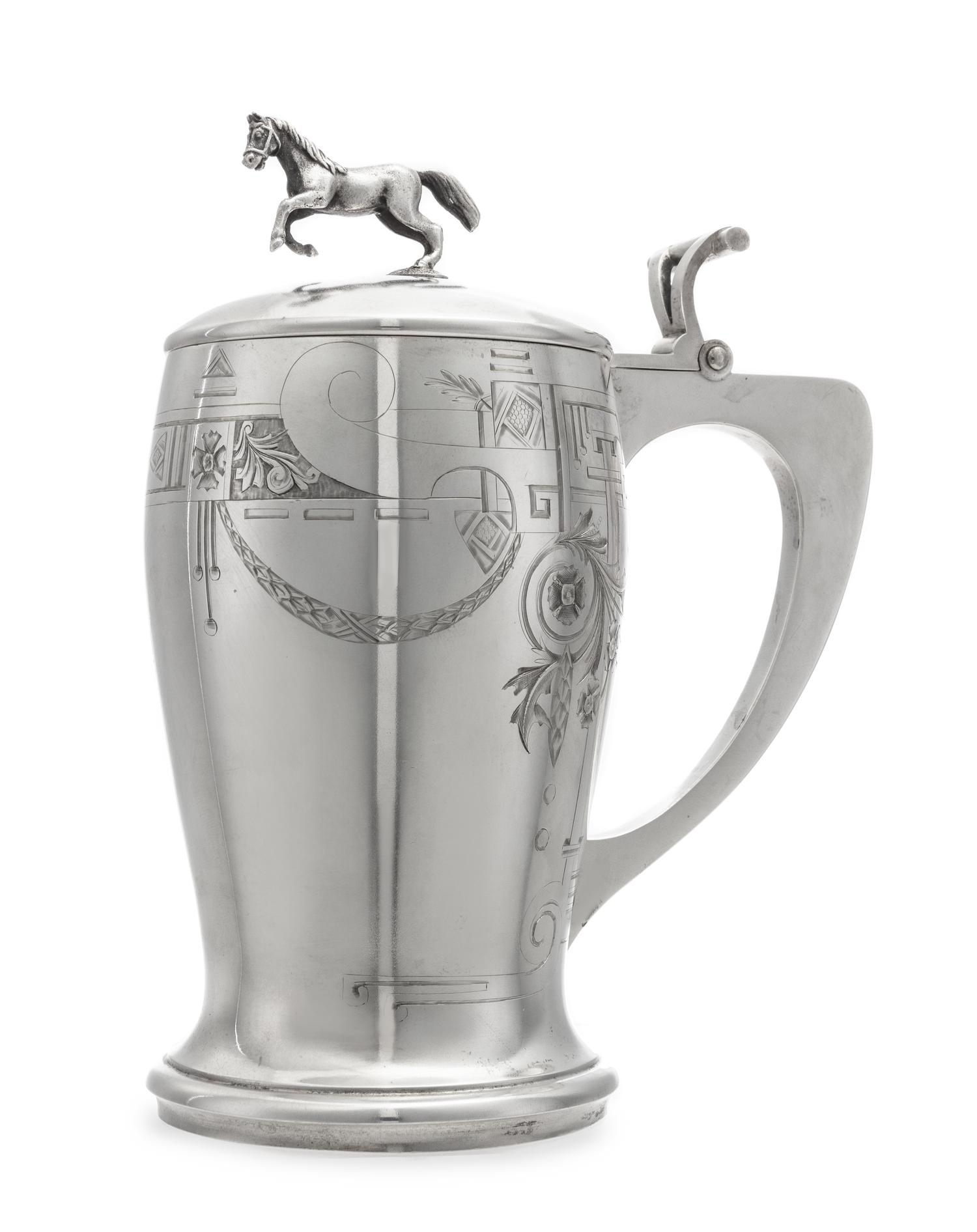 A Russian Silver Tankard, Mark of the 2nd Artel, Moscow, Early 20th Century, the domed lid with a later horse finial, the body engraved