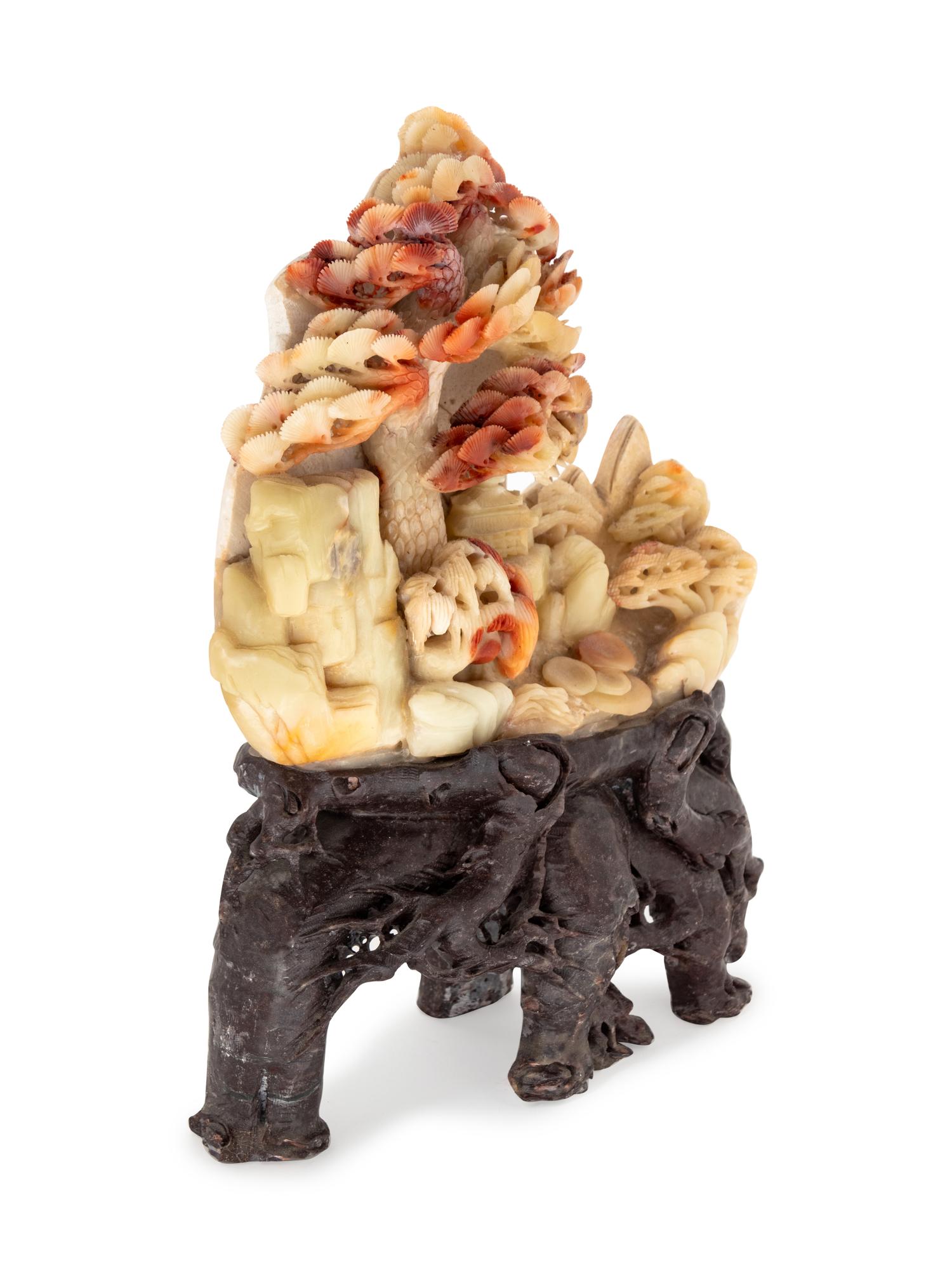 A Chinese Carved Soapstone Group