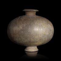 A Chinese Grey Pottery Cocoon Jar, Han Dynasty — 漢 灰陶繭形罐