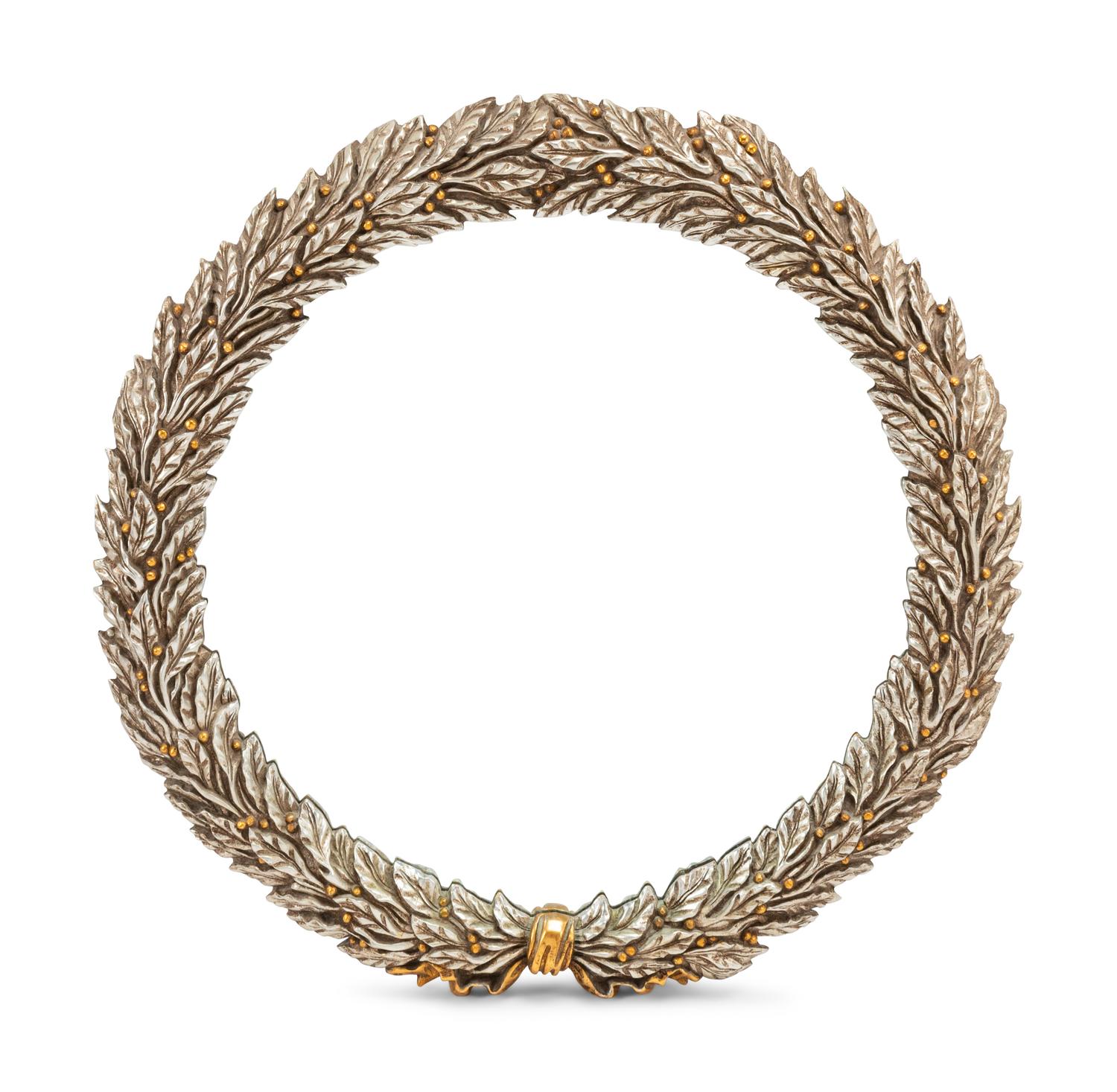 A Pair of Carved, Gilt and Silvered Wood Laurel Wreath Mirrors