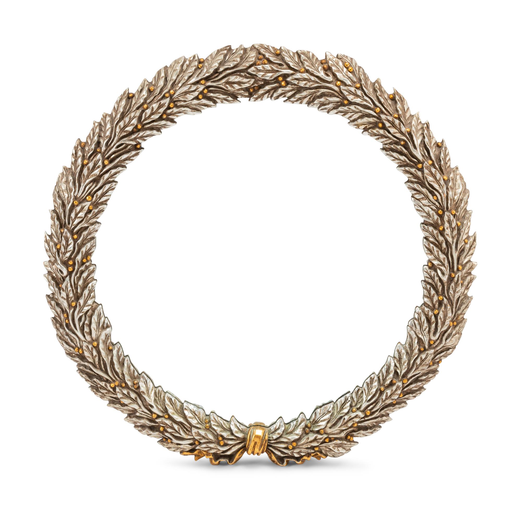 A Pair of Carved, Gilt and Silvered Wood Laurel Wreath Mirrors