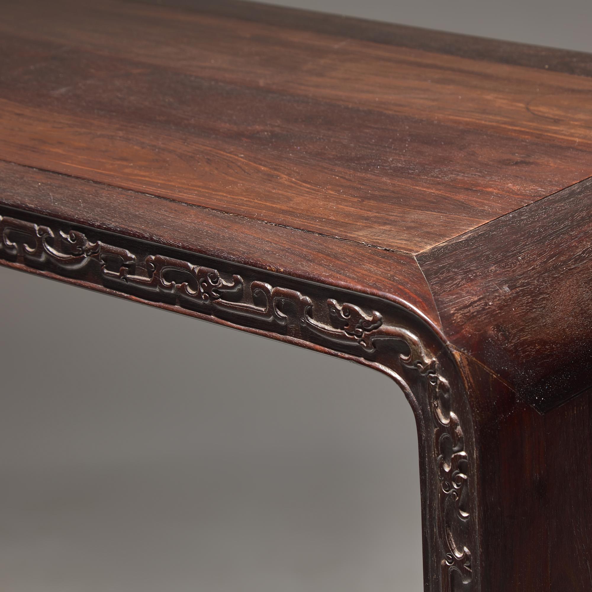 A Chinese Zitan and Hardwood Scroll-Form Altar Table — 紫檀及硬木夔龍紋下卷式小條案