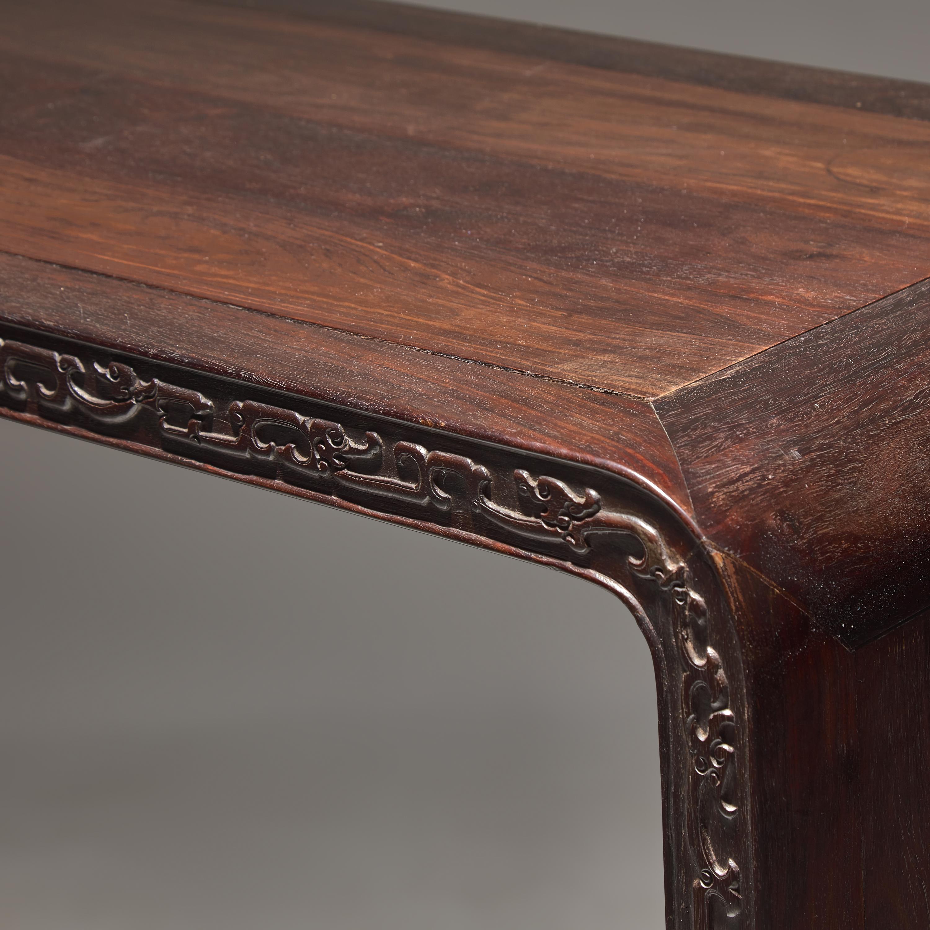 A Chinese Zitan and Hardwood Scroll-Form Altar Table — 紫檀及硬木夔龍紋下卷式小條案