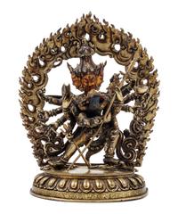 A Sino-Tibetan Gilt Bronze Figure of a Multi-Head Deity