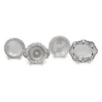 A Group of Four American Silver Repoussé-Decorated Trinket Dishes