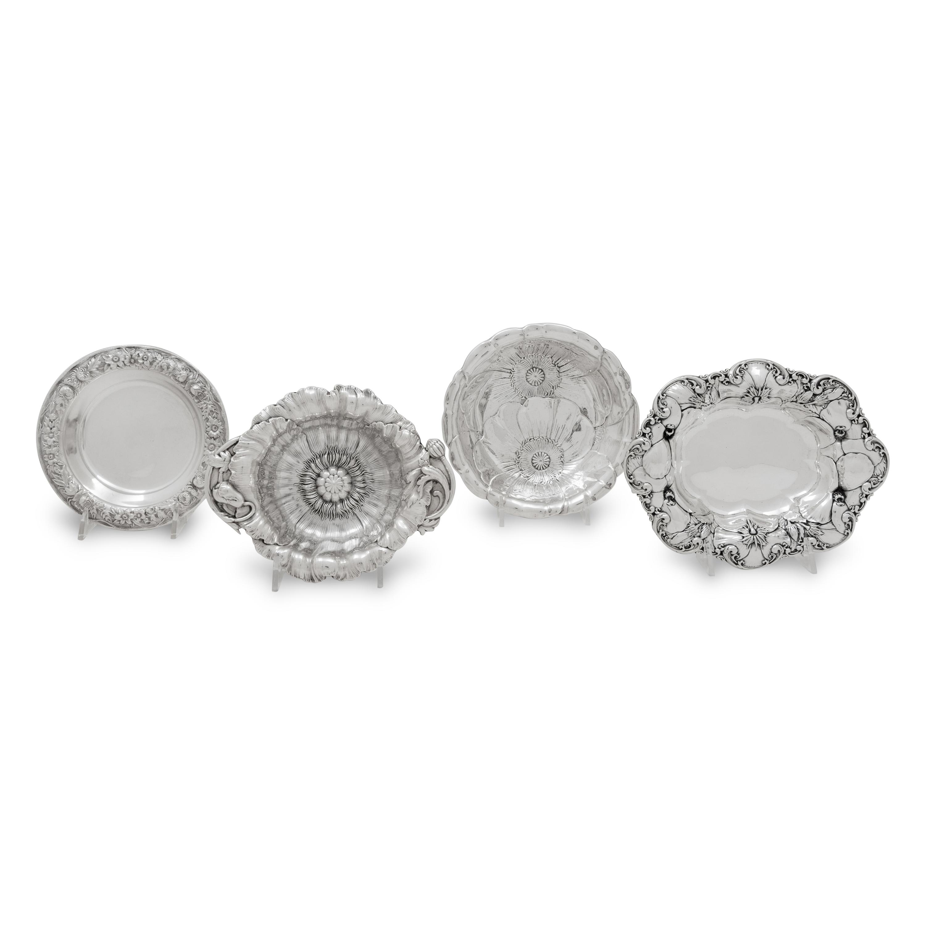 A Group of Four American Silver Repoussé-Decorated Trinket Dishes