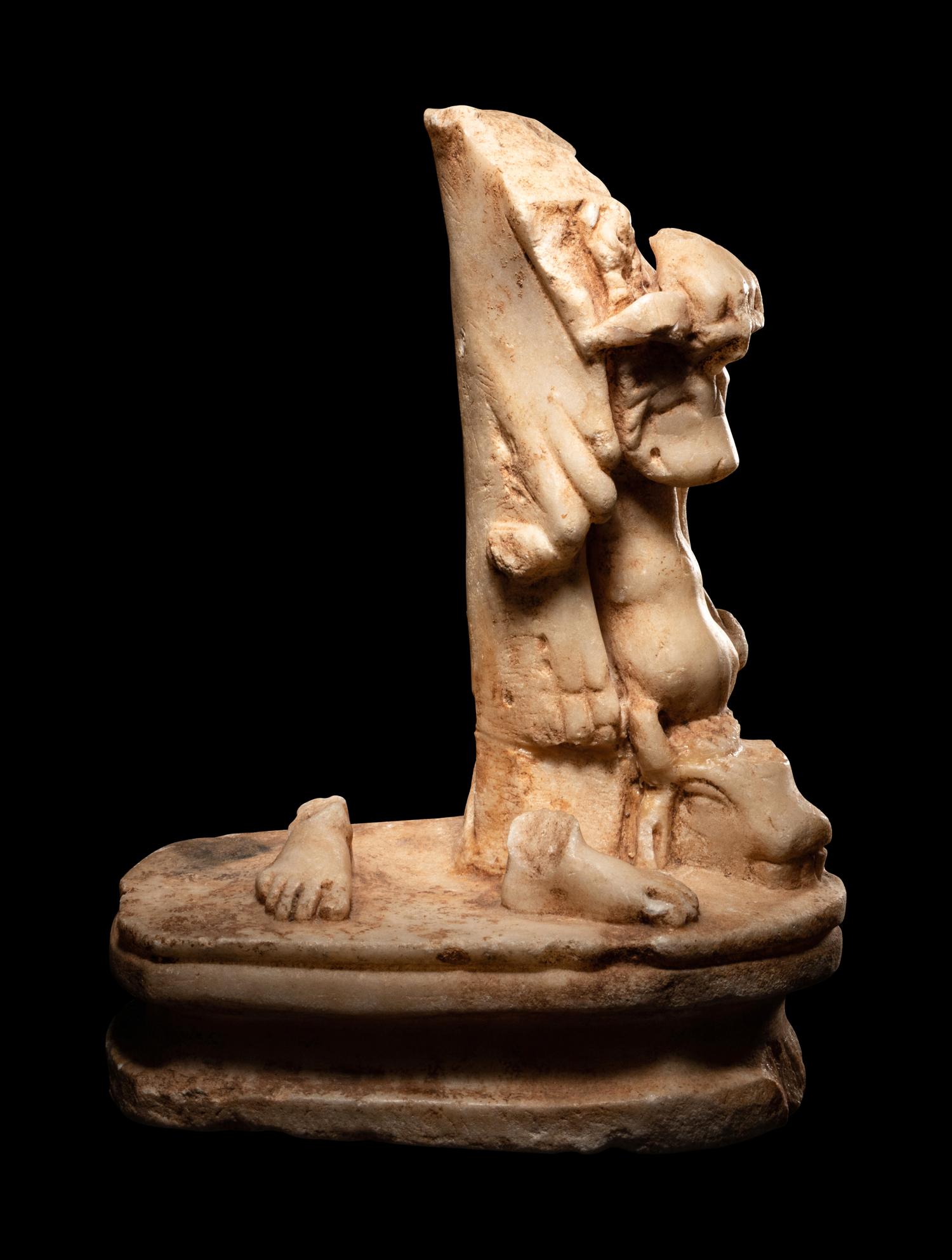 A Roman Marble Sculpture Base from a Statue of Hercules