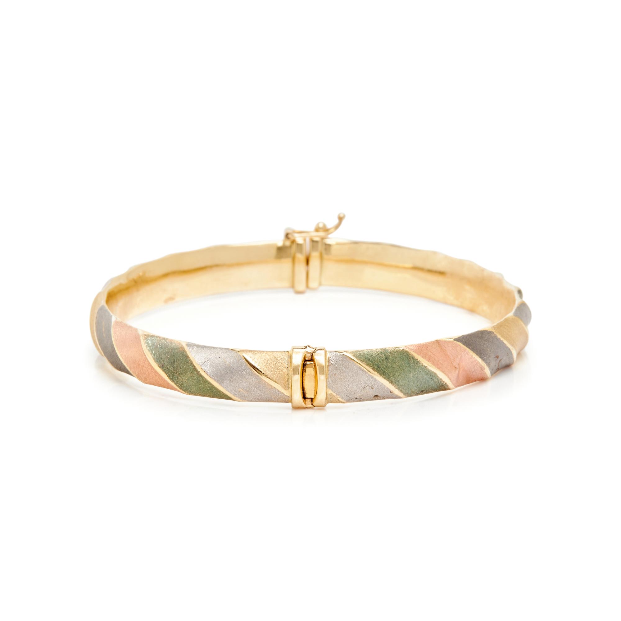 COLLECTION OF GOLD BANGLE BRACELETS