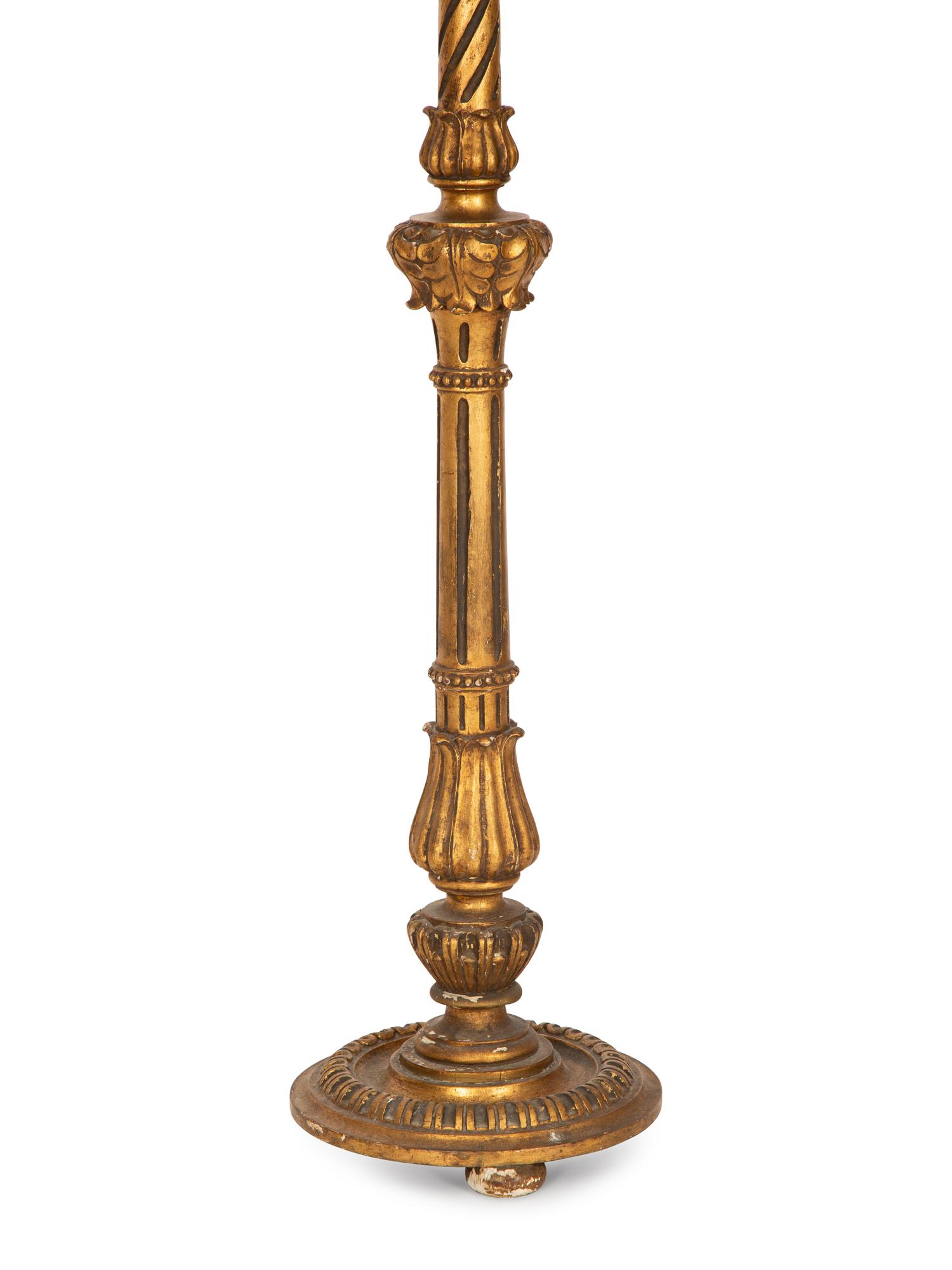 An Italian Giltwood Pedestal Table and a Torchère Mounted as a Floor Lamp