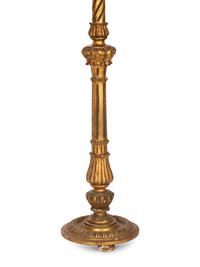 An Italian Giltwood Pedestal Table and a Torchère Mounted as a Floor Lamp
