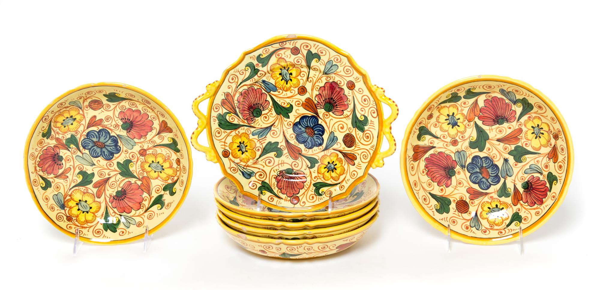 A Group of Seven Italian Faience Plates Width of handled plate 10 1/2 inches.