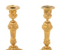 A Pair of Louis XVI Style Gilt Bronze Candlesticks