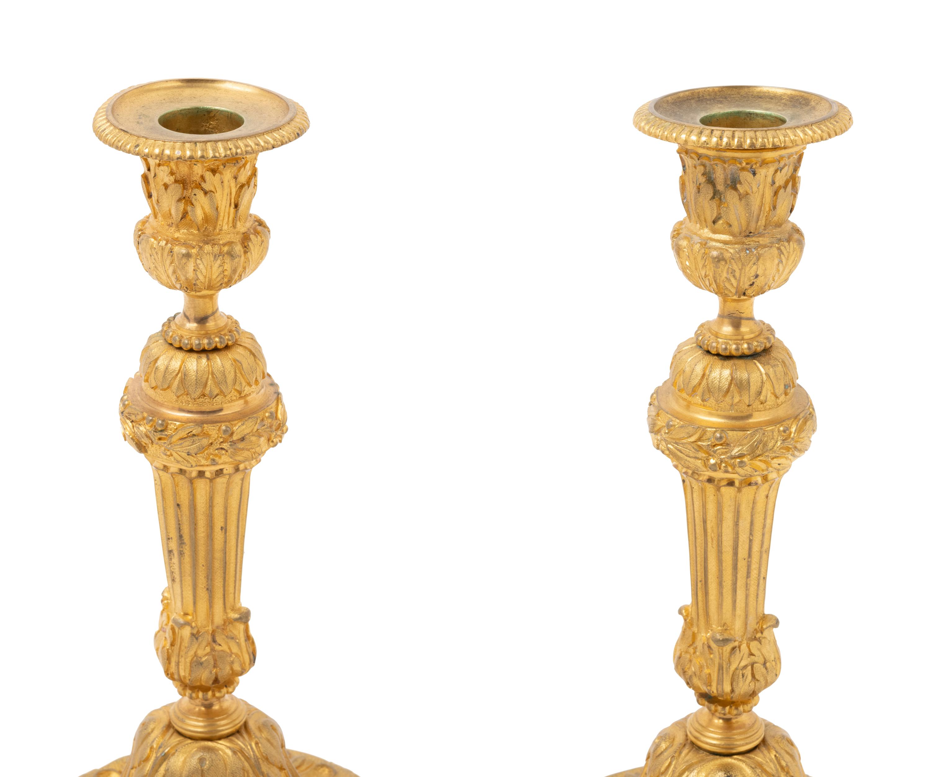 A Pair of Louis XVI Style Gilt Bronze Candlesticks