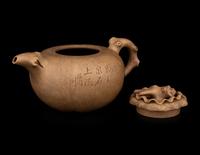 A Chinese Yixing Zisha Pottery Teapot