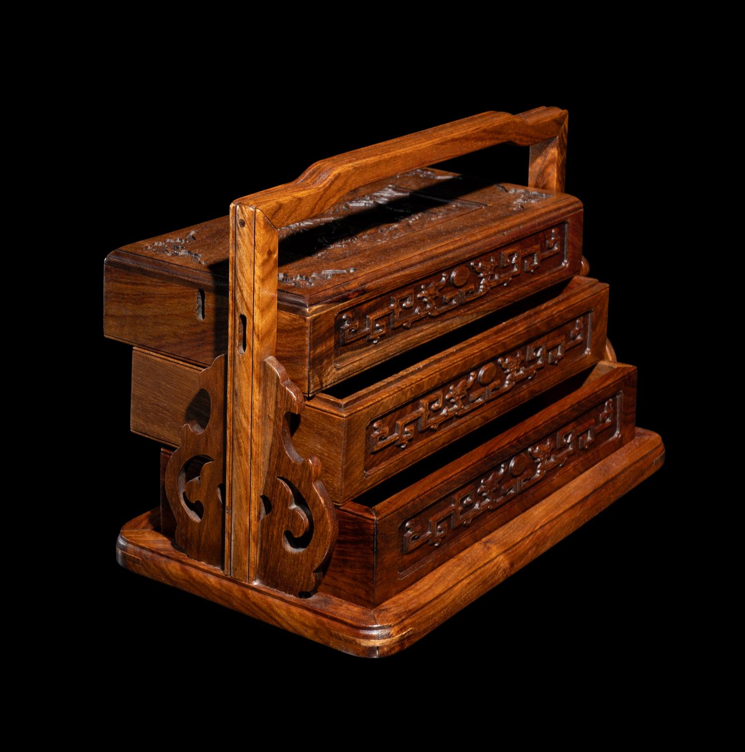 A Chinese Huanghuali Two-Tiered Picnic Box and Cover, Tihe