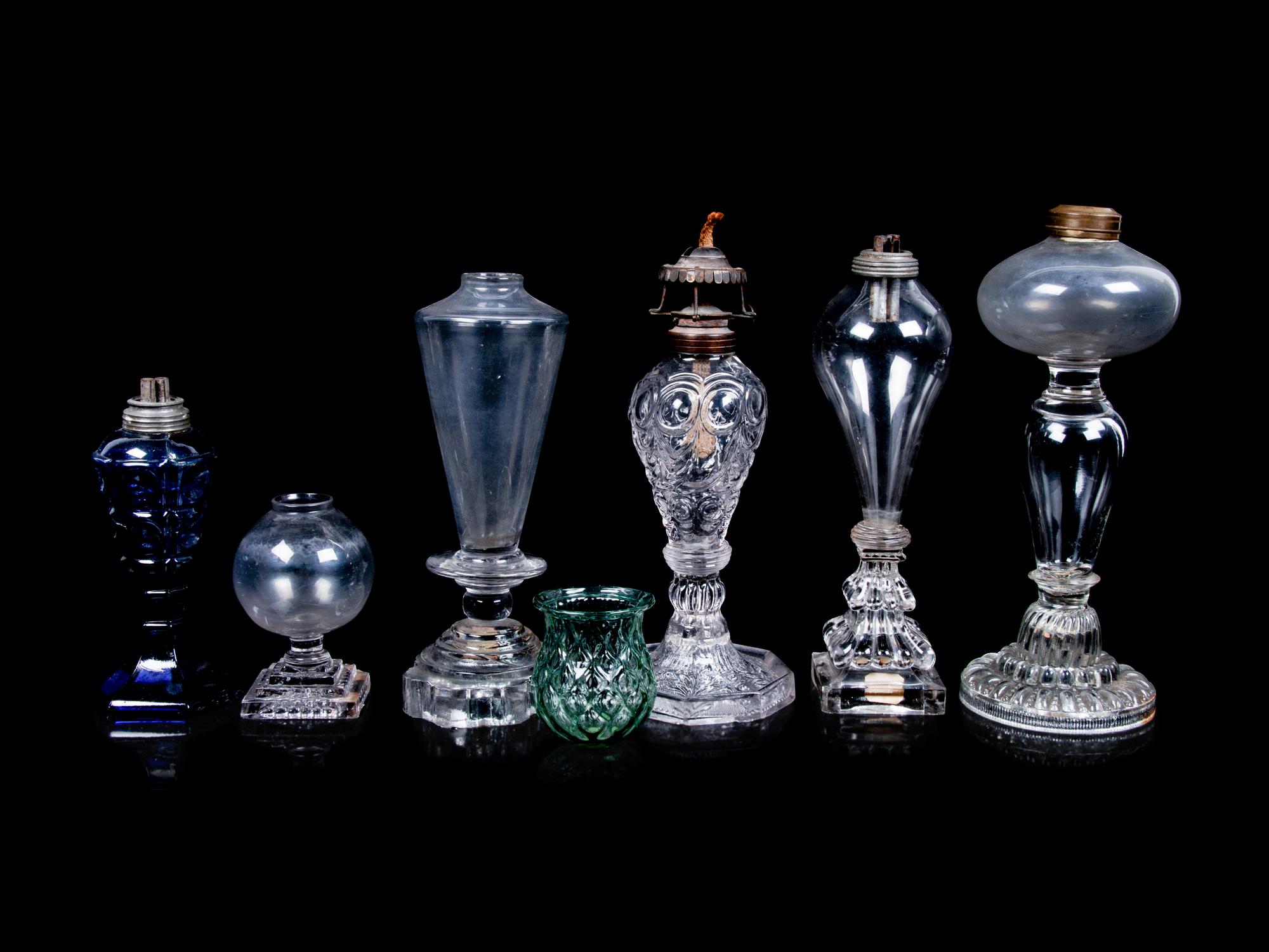 A Collection of Glass Oil Lamp Bases