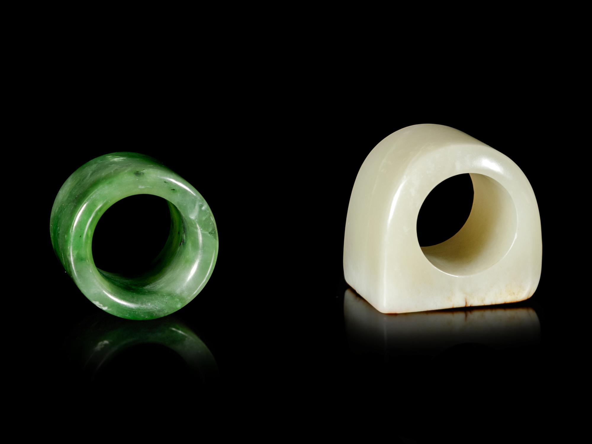 Two Chinese Jade and Hardstone Archer's Rings