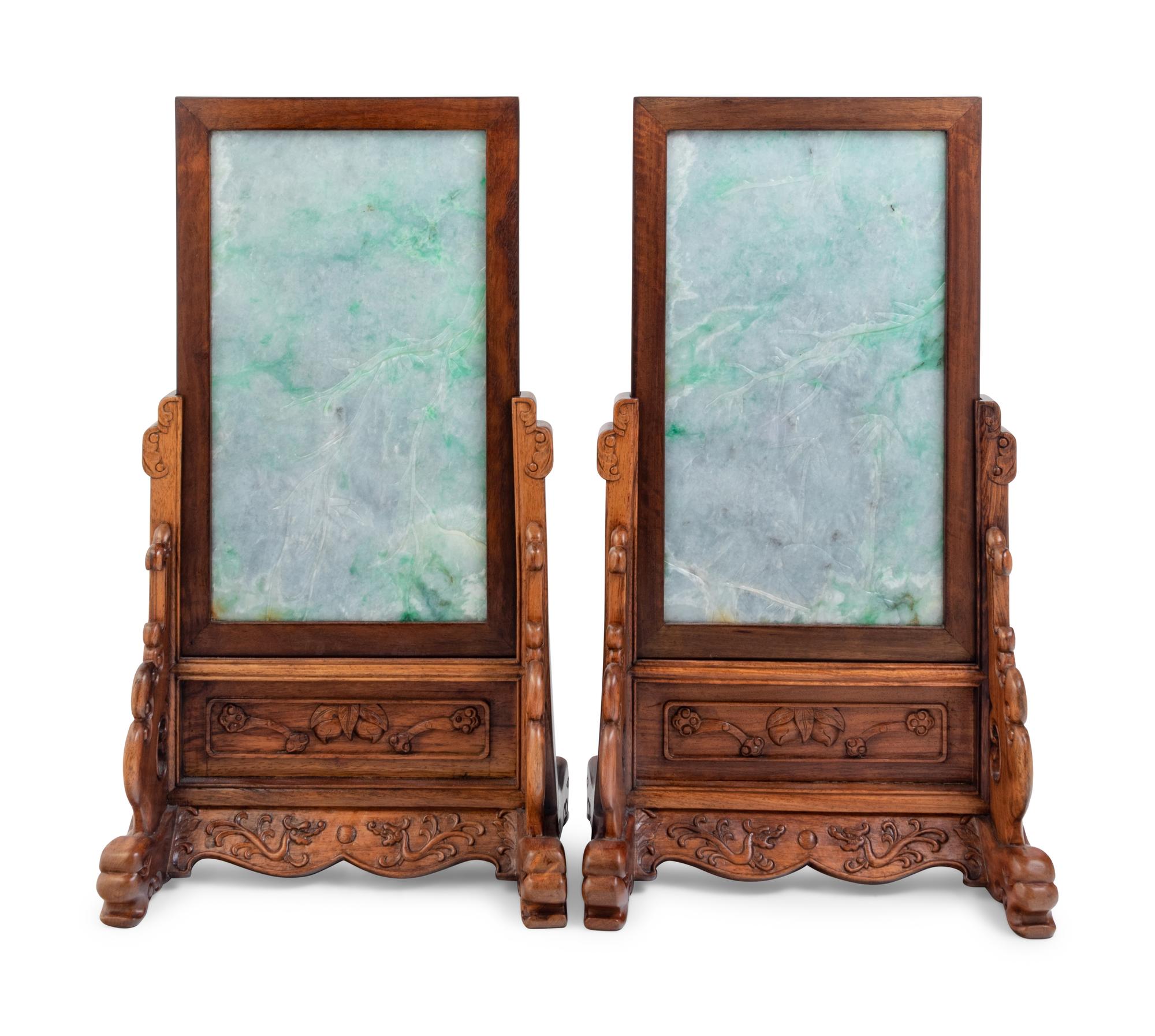 A Set of Four Chinese Export Carved Lavender and Green Jadeite Table Screens in Hardwood Stands