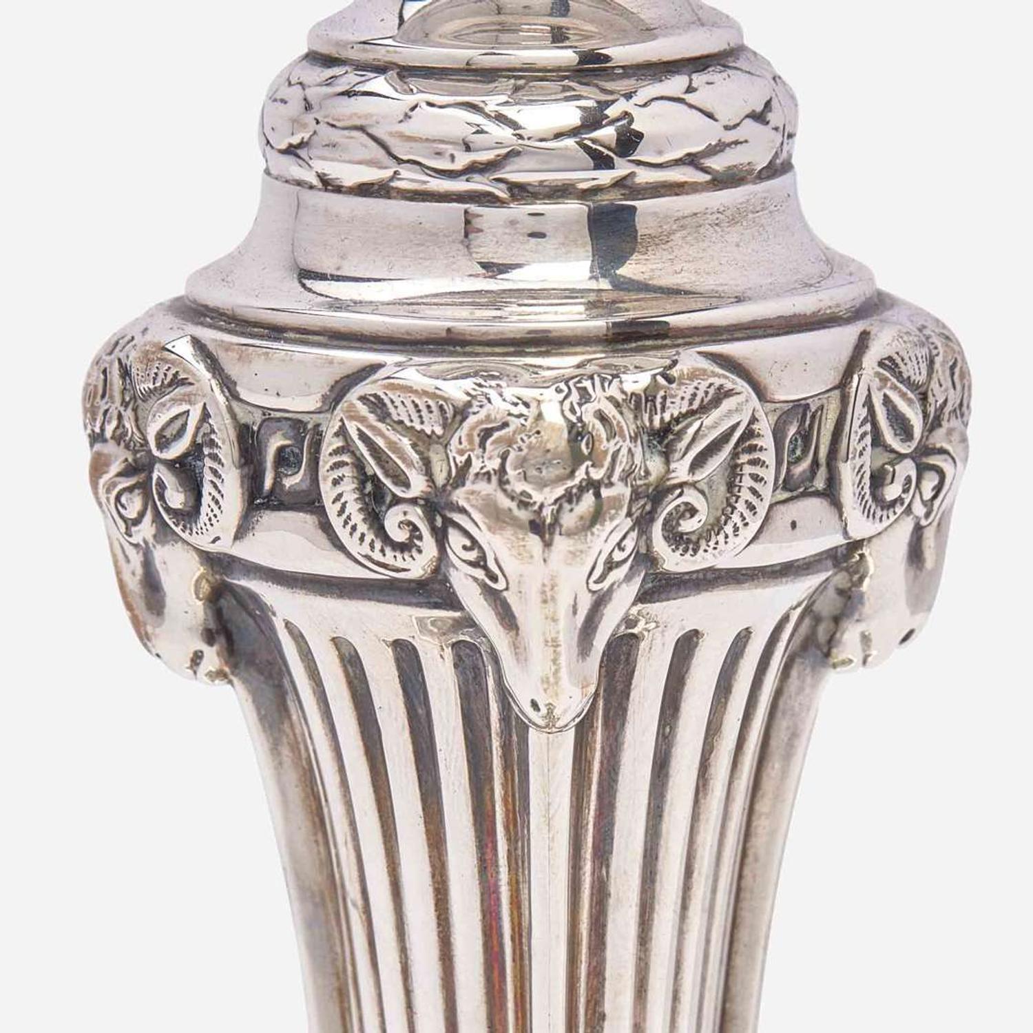 A set of four George III sterling silver weighted candlesticks John Carter II, London, 1774