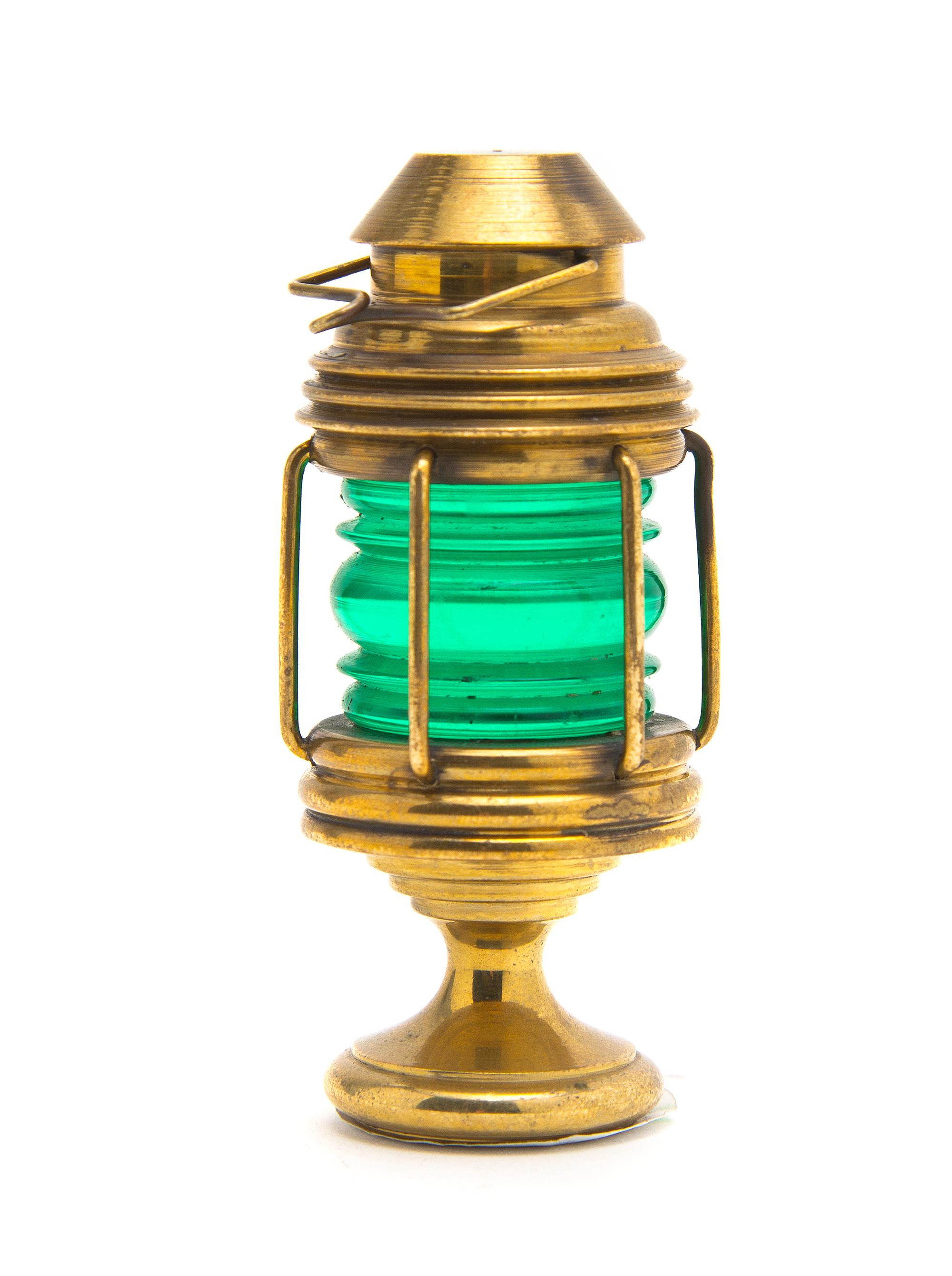 A Brass and Glass Seal, Height over handle 3 1/8 inches.