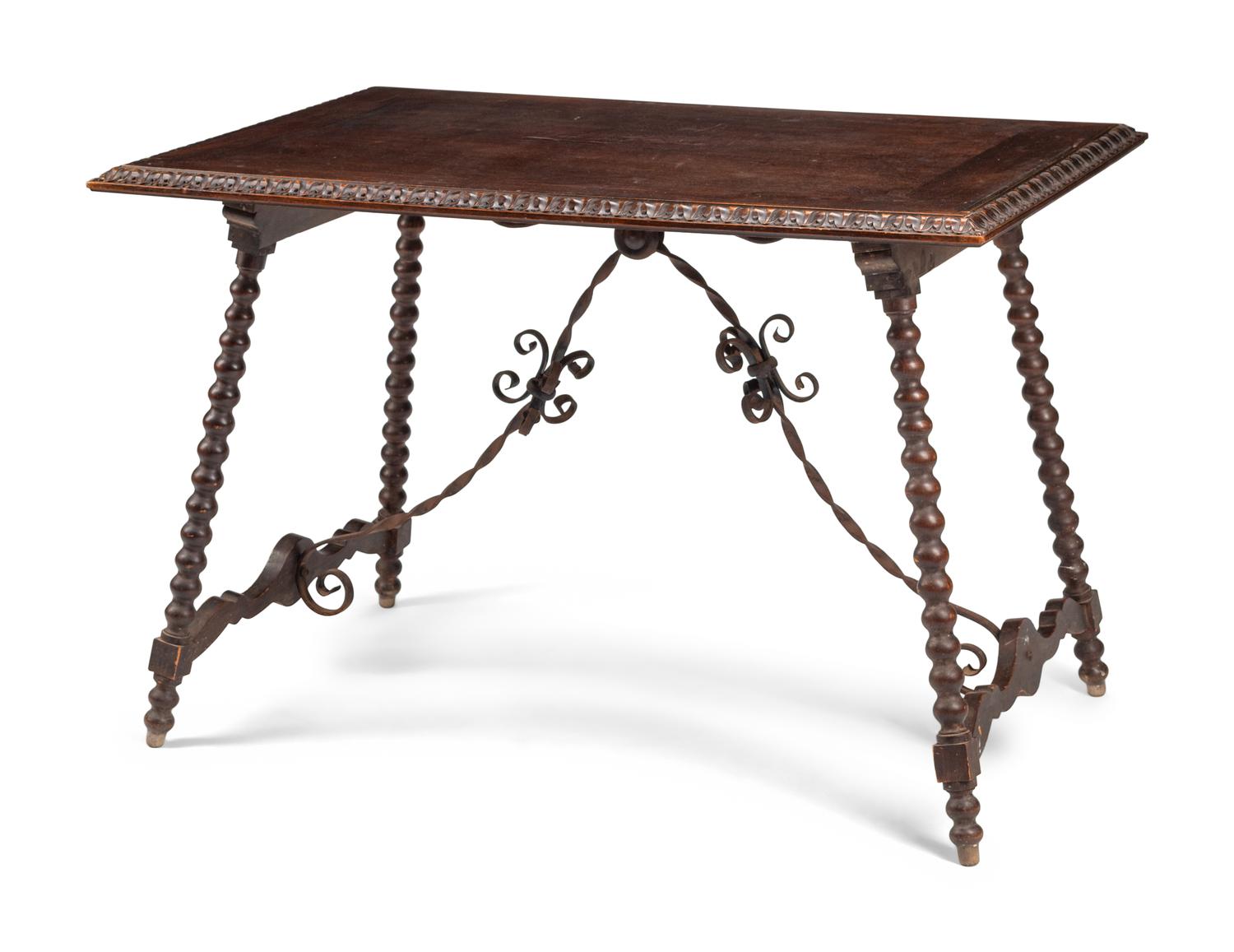 A Renaissance Style Iron Mounted Walnut Table