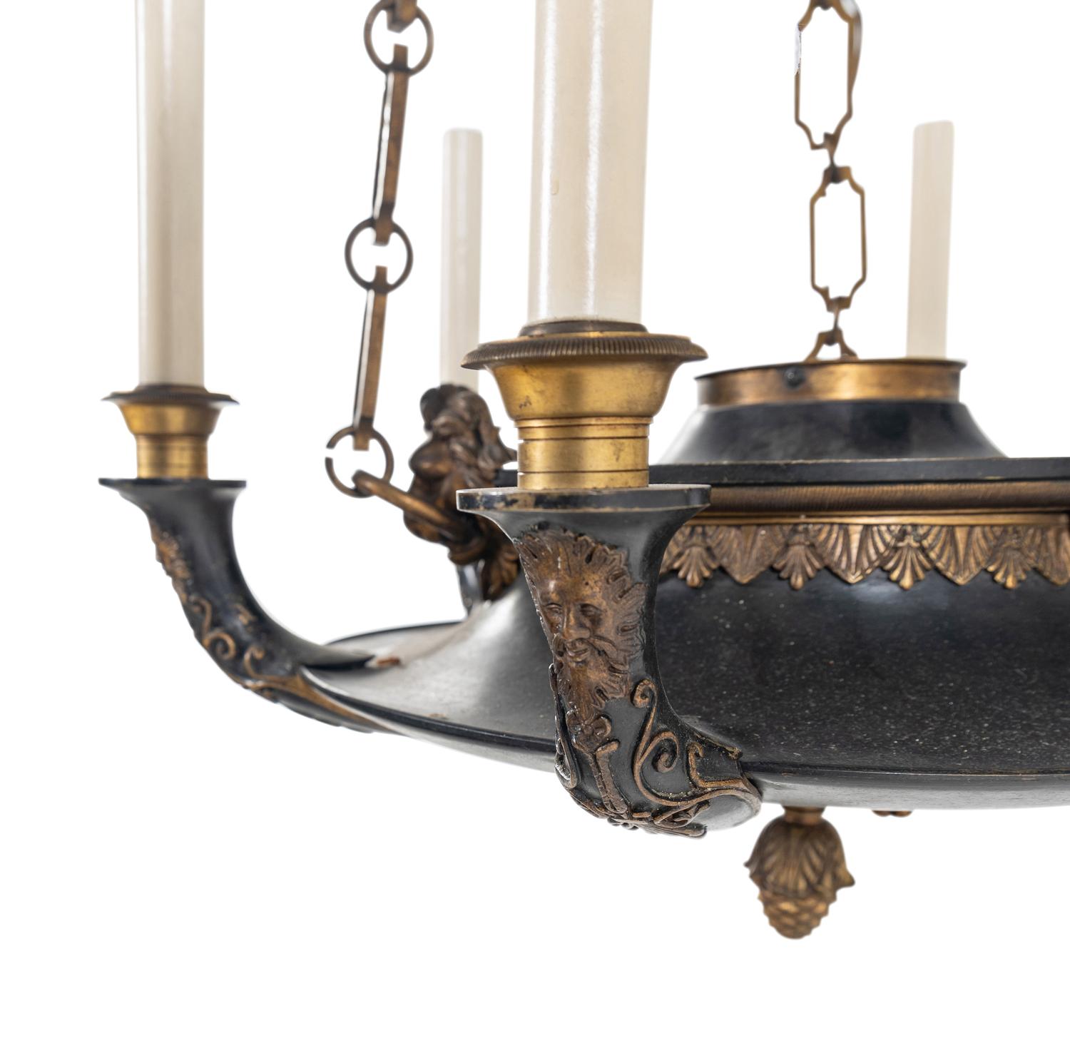 An Empire Style Gilt Bronze and Tole Six-Light Chandelier