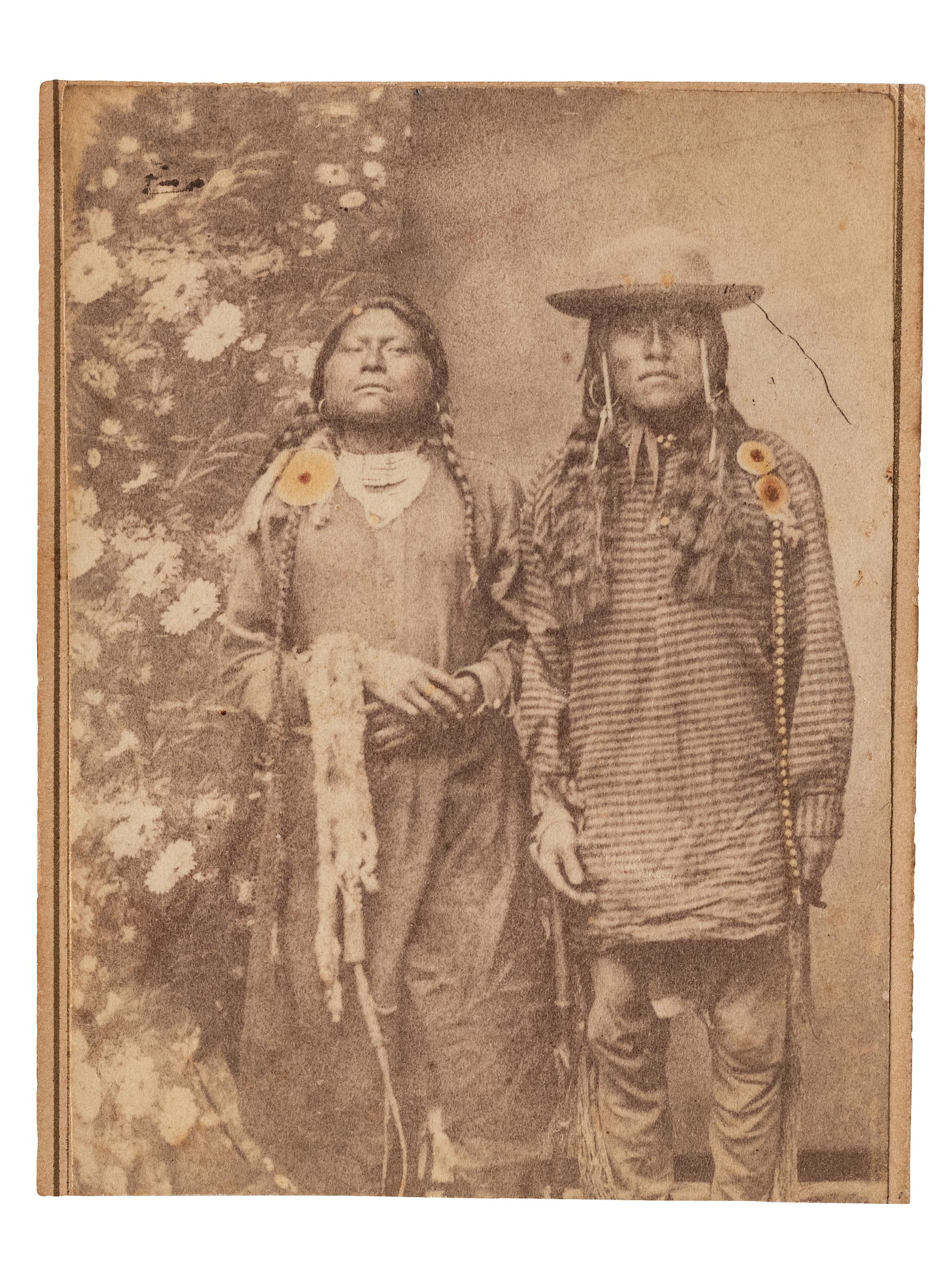 [NATIVE AMERICANS]. MCKENNY, A.S., photographer. CDV of Ute Indians in a studio setting. Blackhawk, Colorado Territory. Ca 1870.