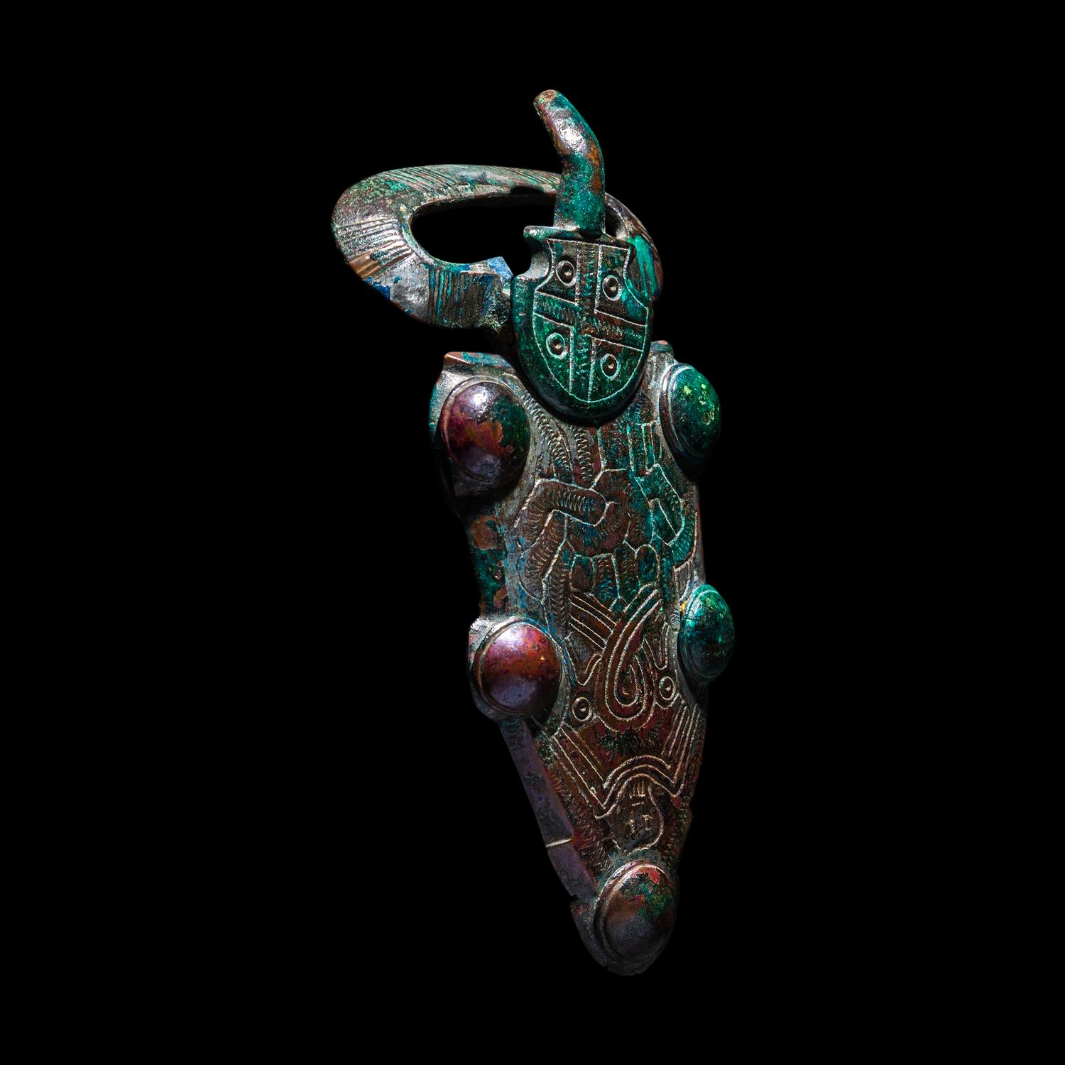 A Merovingian Tinned-Bronze Belt Buckle