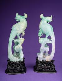 A Pair of Semi-Translucent Green Jadeite Figures of Phoenix