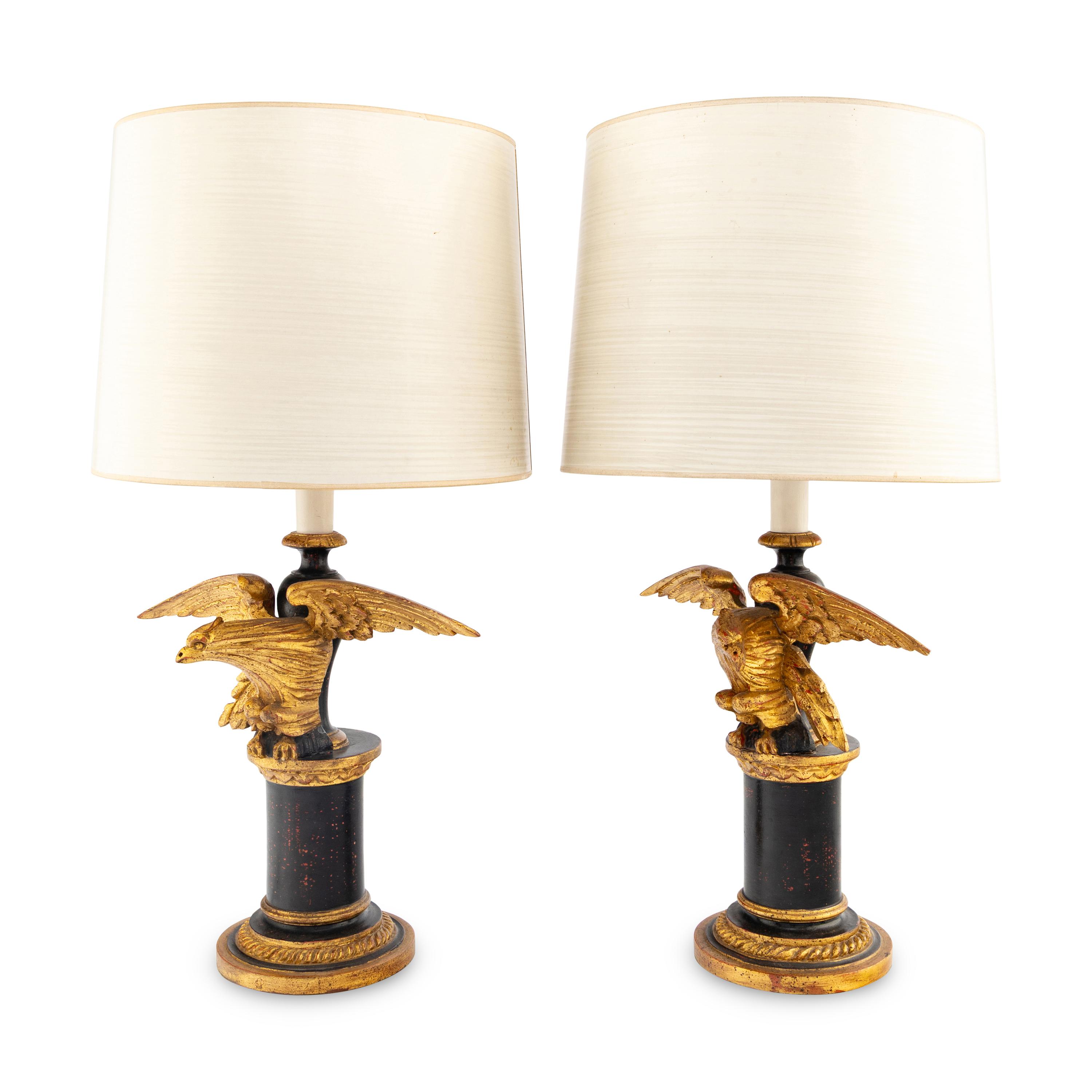 A Pair of Painted and Parcel Gilt Eagle-Form Lamps