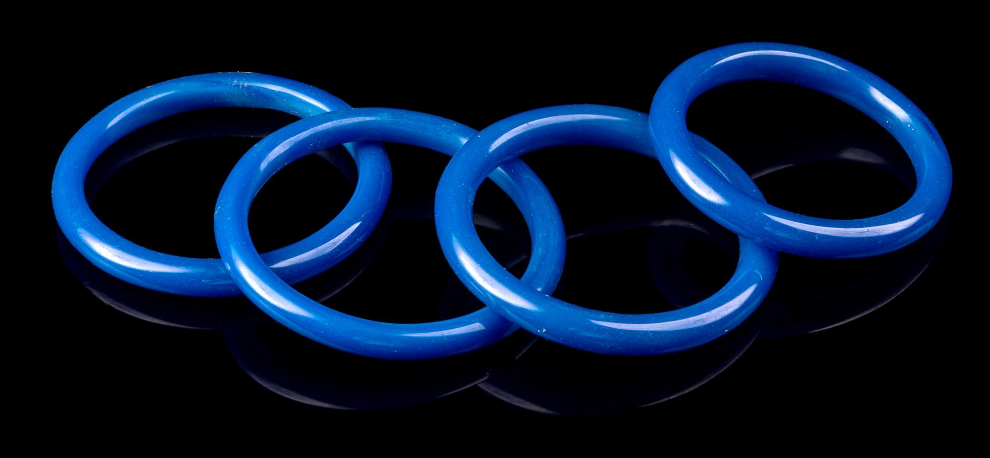 Four Chinese Blue Peking Glass Bangles