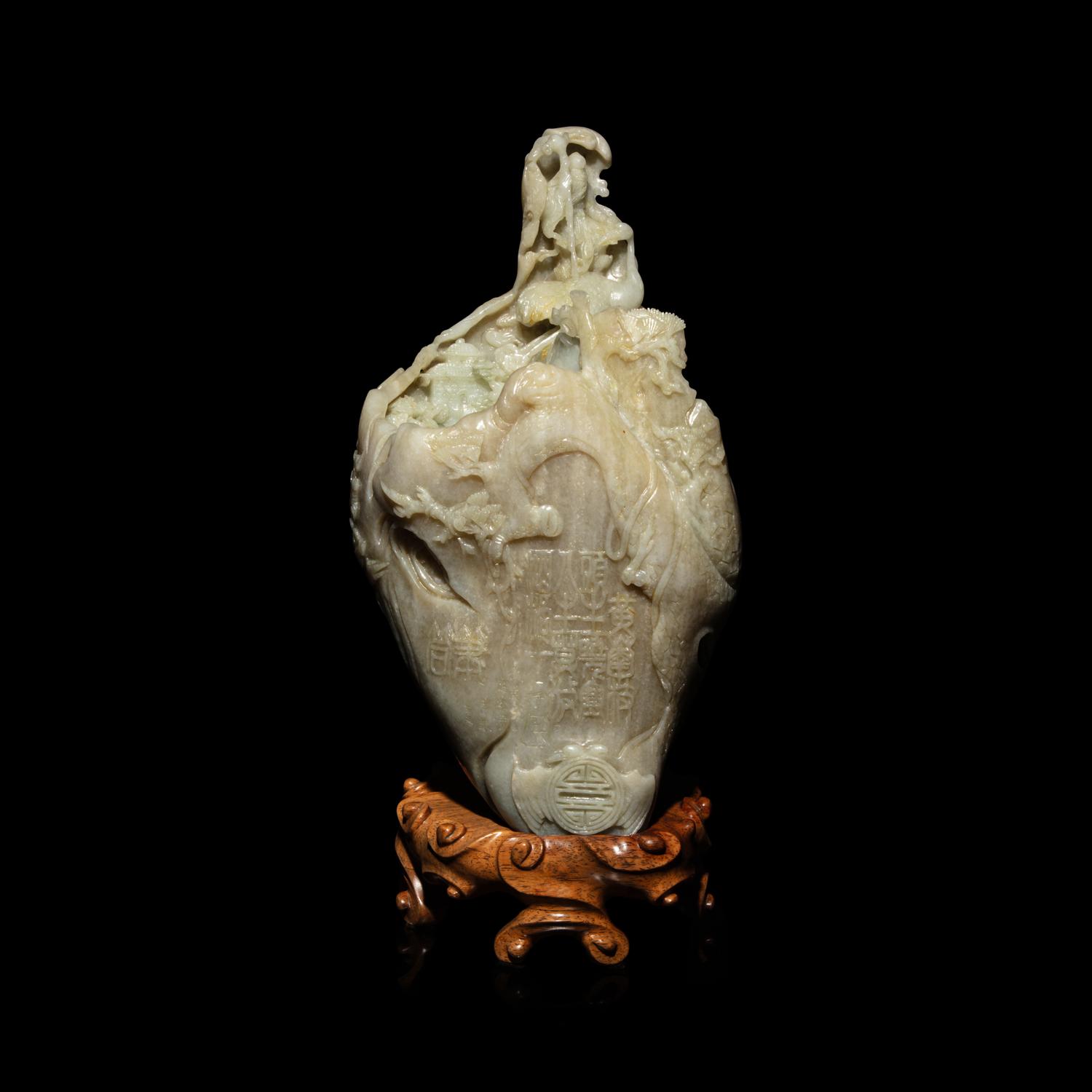 A Chinese Pale Celadon and Russet Jade 'Tree-Trunk' Brushpot, Bitong, 20th Century — 近代 青白玉仿木大筆筒