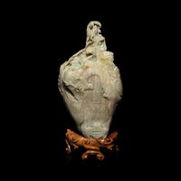 A Chinese Pale Celadon and Russet Jade 'Tree-Trunk' Brushpot, Bitong, 20th Century — 近代 青白玉仿木大筆筒