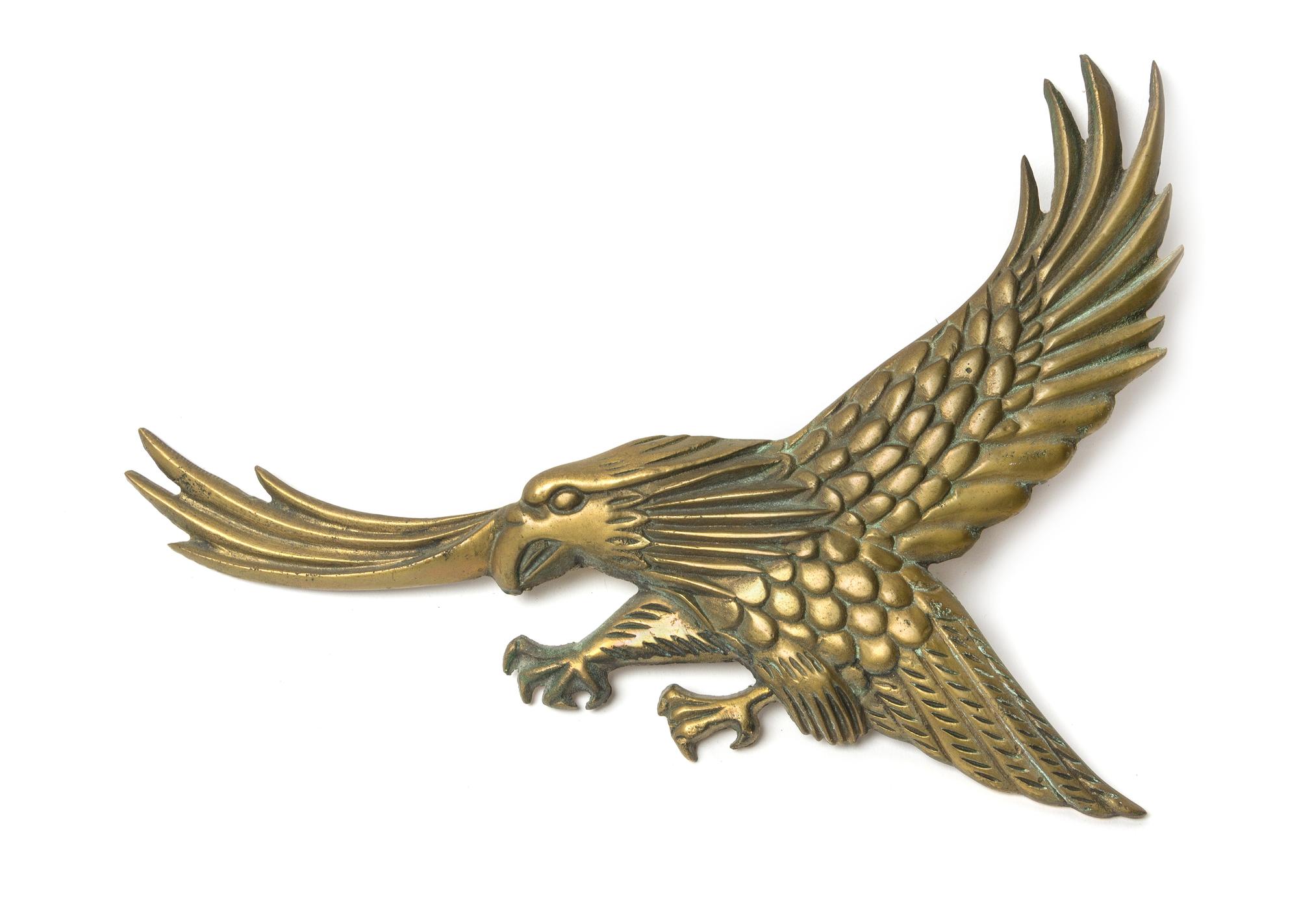 A Brass Eagle Applique Width 13 inches. — 20TH CENTURY
