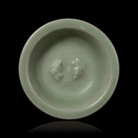 A Chinese Longquan Celadon Glazed 'Double Fish' Dish, Song-Yuan Dynasty 宋-元 龍泉窯雙魚碟