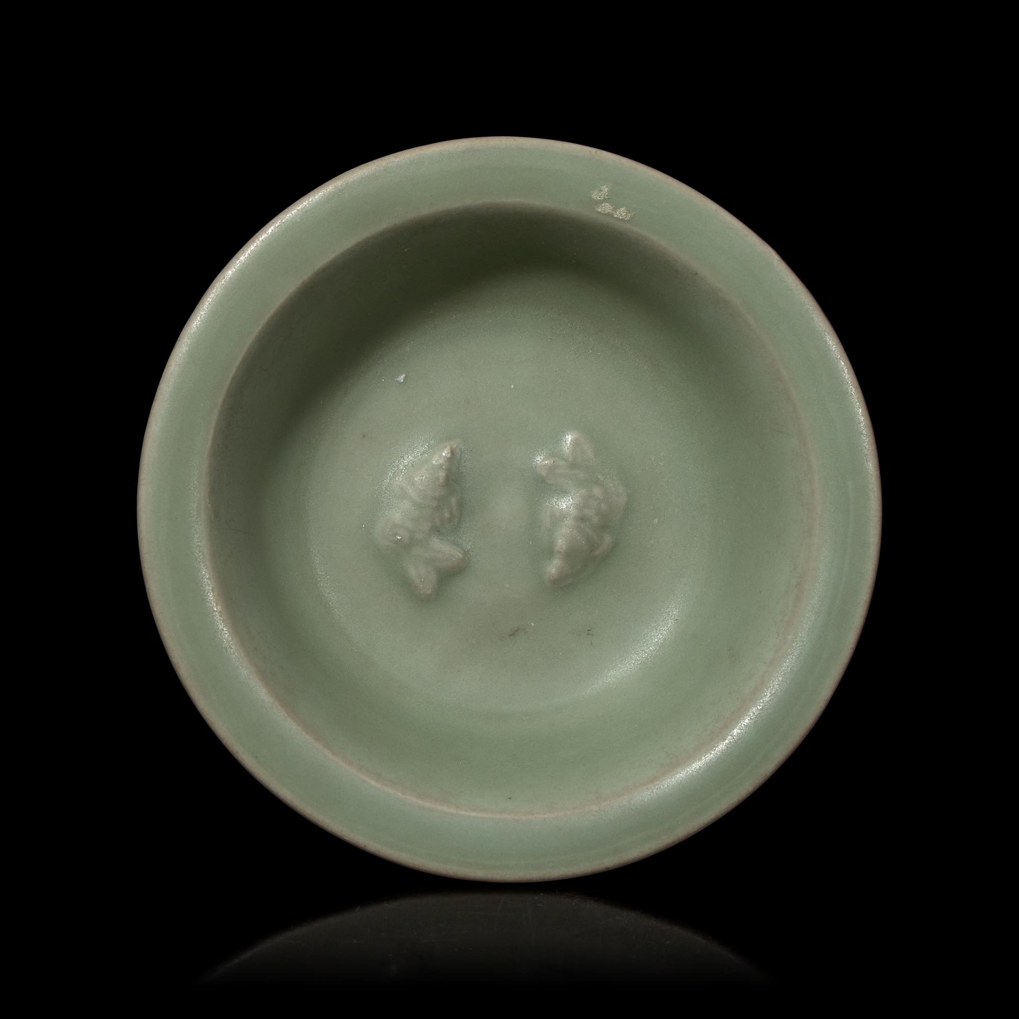 A Chinese Longquan Celadon Glazed 'Double Fish' Dish, Song-Yuan Dynasty 宋-元 龍泉窯雙魚碟